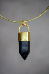 Smoky Quartz gold-capped crystal pendant displayed on a choker-style necklace with dark smoky point.