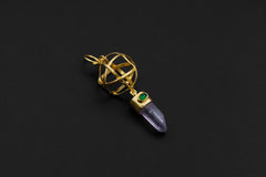 Vera Cruz Amethyst Emerald sphere pendant in 18k gold-plated sterling silver, shown on a dark background with geometric cage frame.