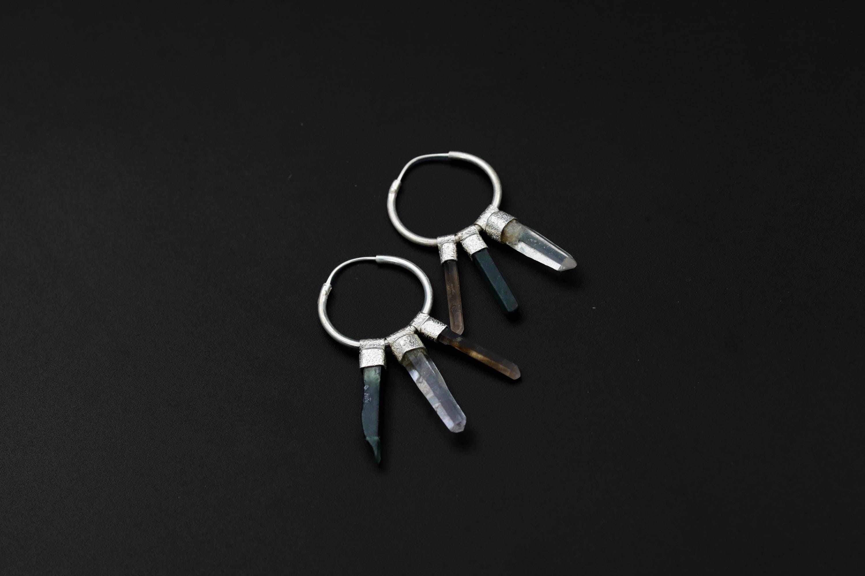 Green Jade Smoky Quartz Clear Quartz sterling silver hoop earring shown on dark background with stacked crystal design.