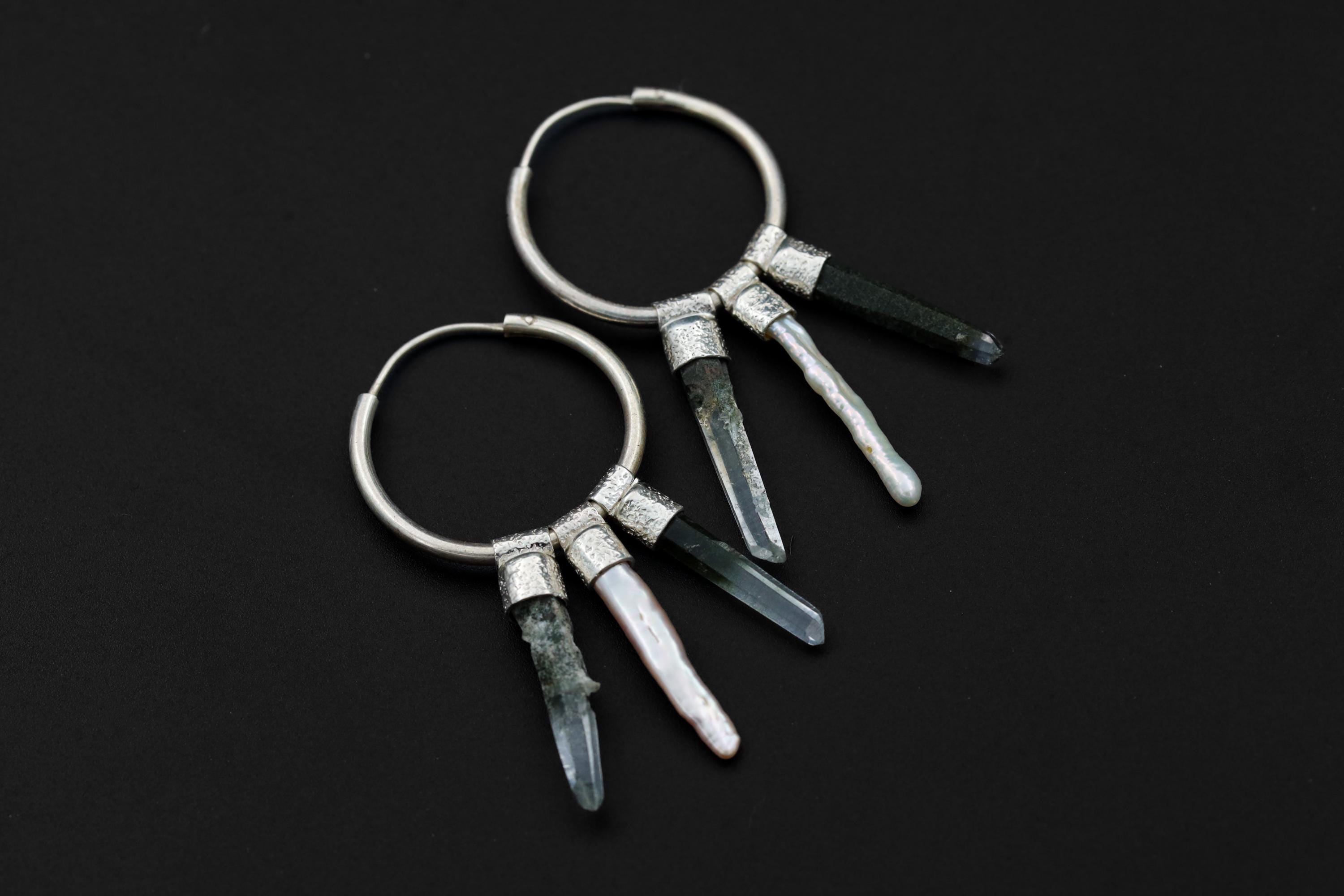 Himalayan Chlorite Quartz Pearl sterling silver hoop earring shown on dark background with stacked crystal and pearl design.