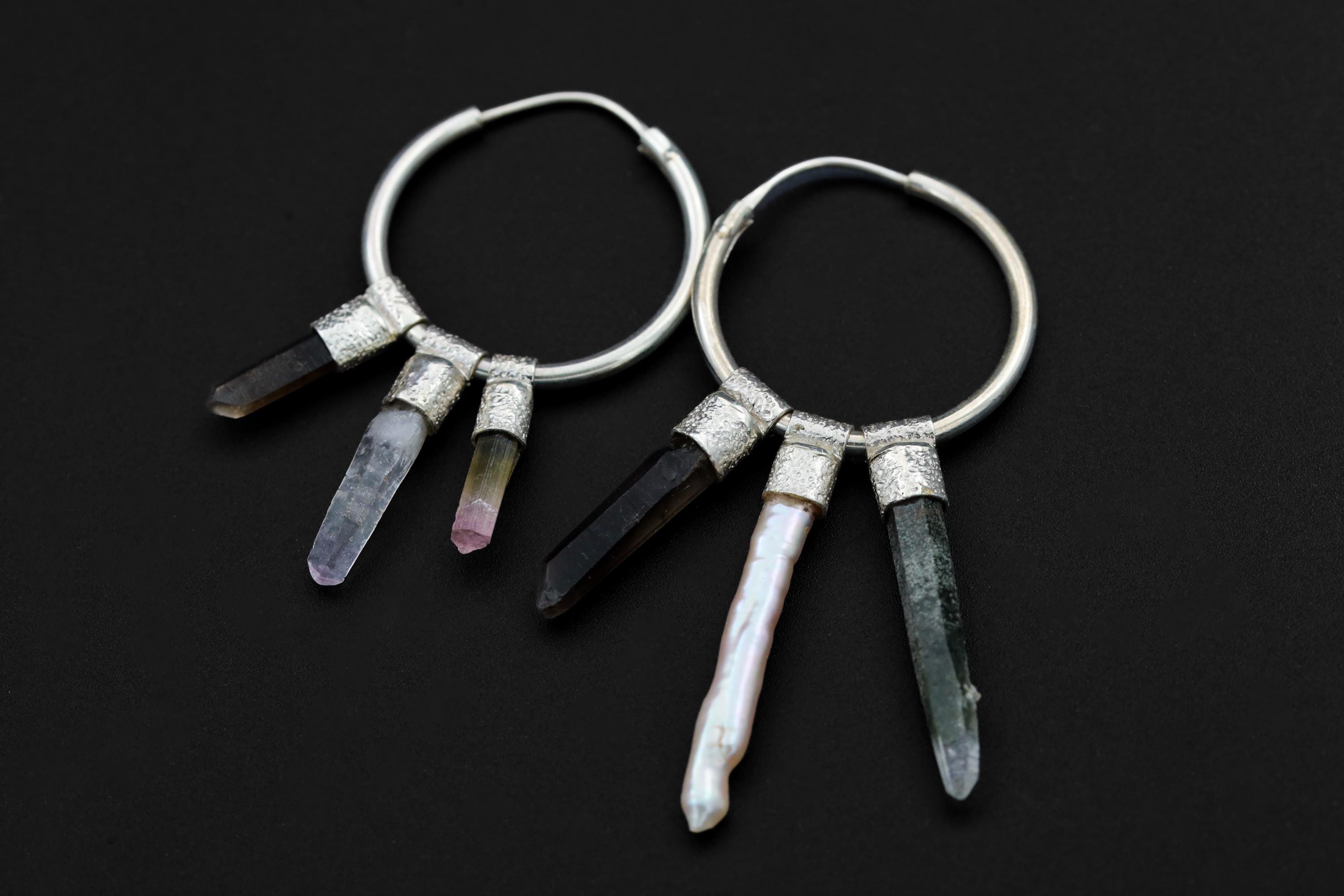 Close-up of Smoky Quartz, Vera Cruz Amethyst, Watermelon Tourmaline, Pearl, and Himalayan Quartz on silver hoop earrings.