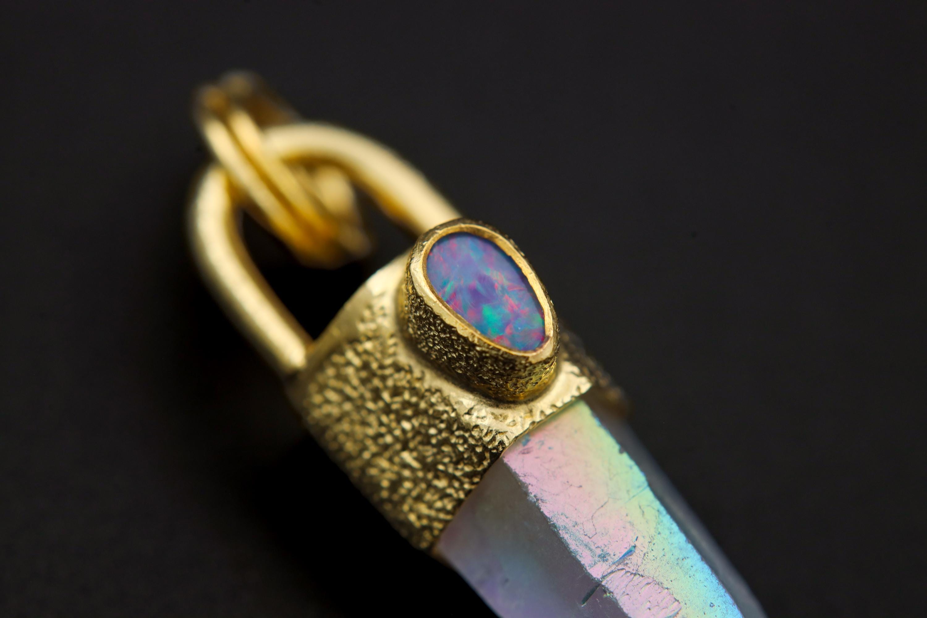 Detail view of Opal Doublet set into the front cap of an Opal Angel Aura Quartz pendant with gold-plated sterling silver.