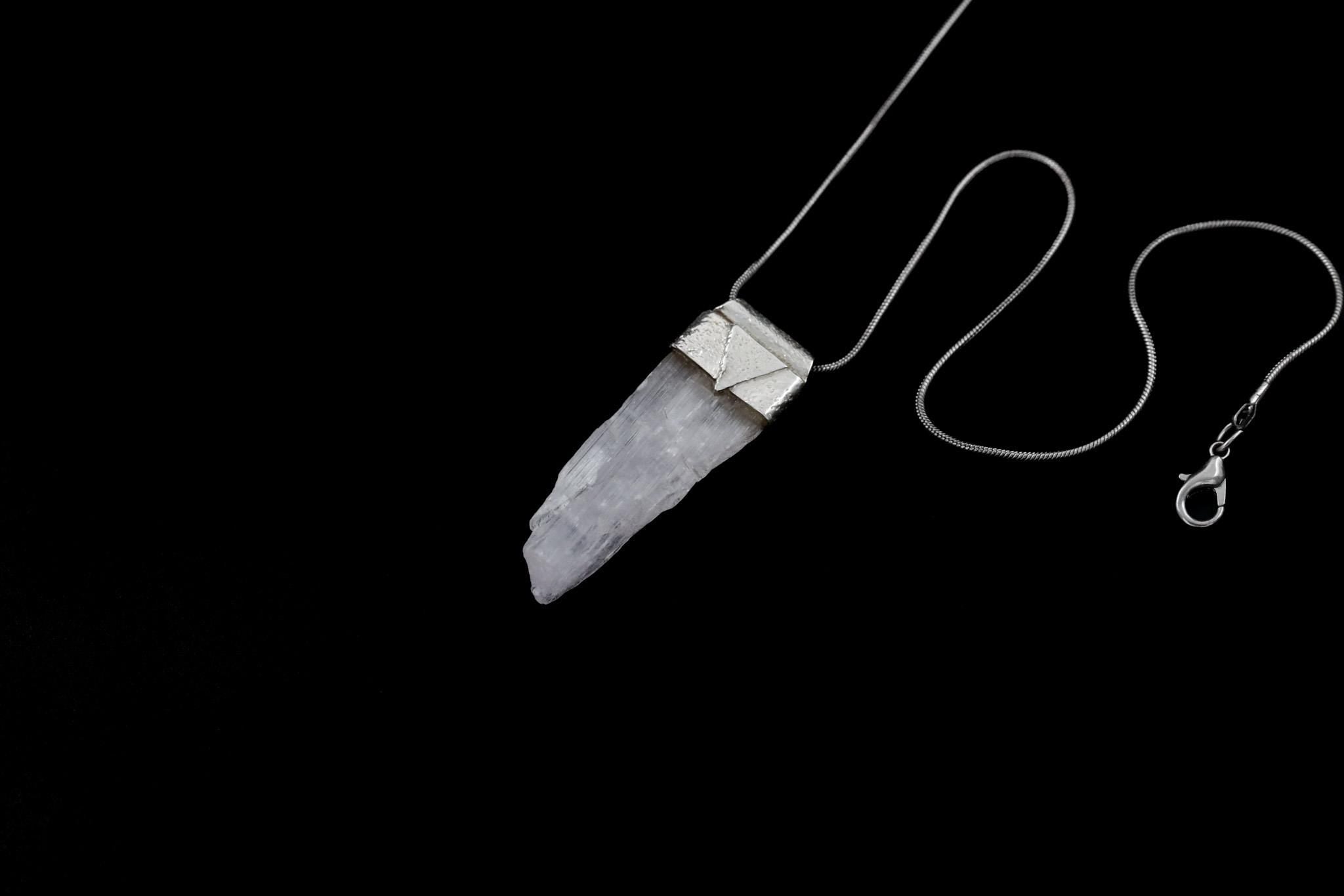Himalayan Spodumene Stack Pendant shown worn close-up as a delicate sterling silver layering necklace.