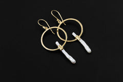 Golden Portal Baroque Pearl hoop earrings in 18k gold-plated 925 sterling silver shown worn on a model.