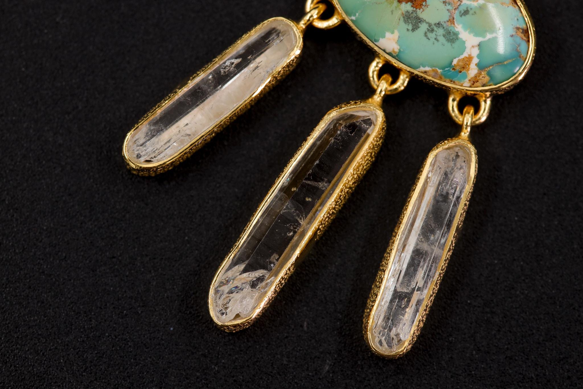 Three raw clear quartz dangles, double terminated