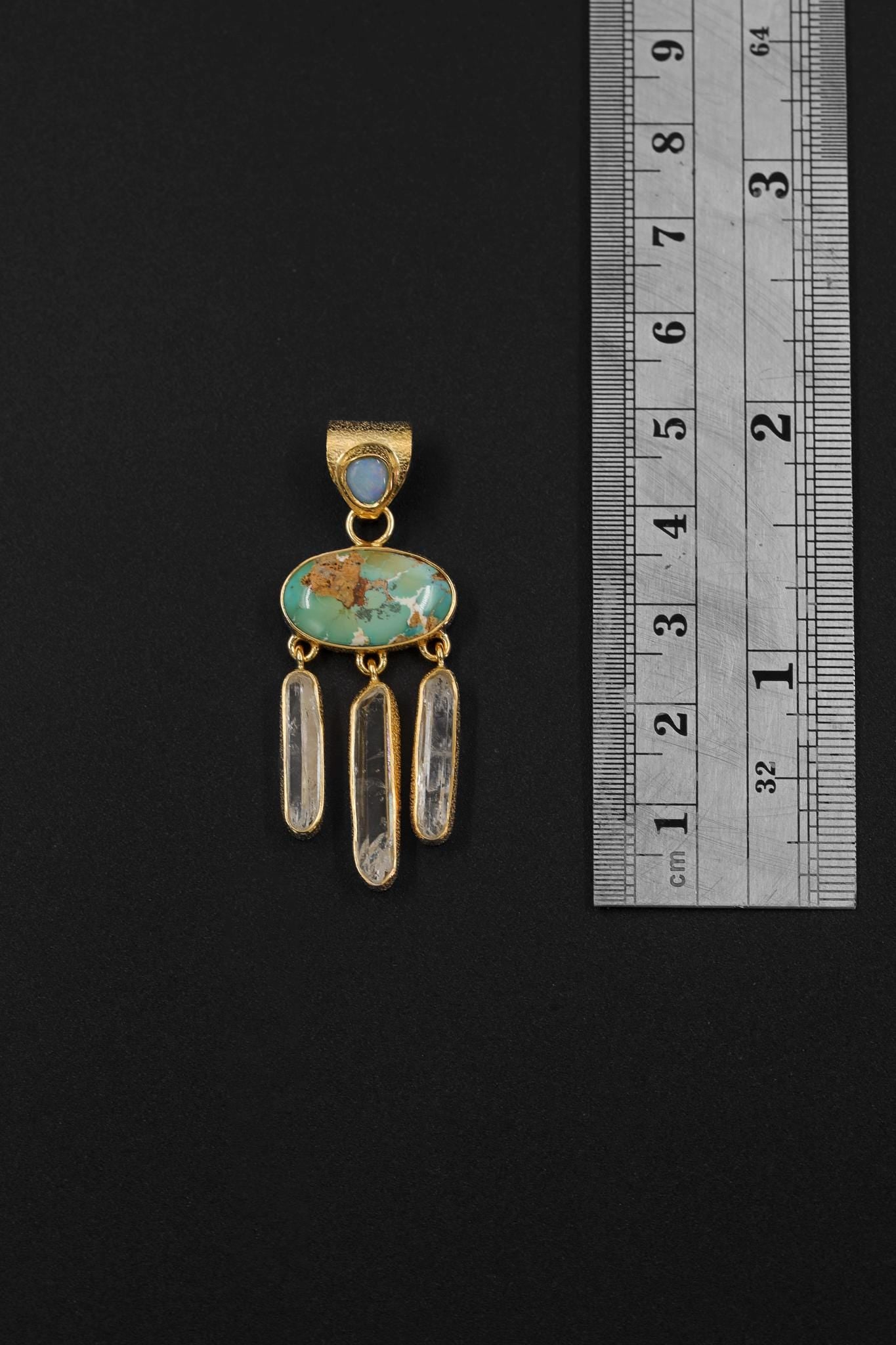 Arizona Turquoise Opal Clear Quartz pendant shown beside a ruler for scale, measuring approximately 5 cm total drop.