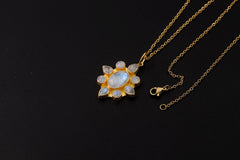 blue moonstone flower necklace on gold chain