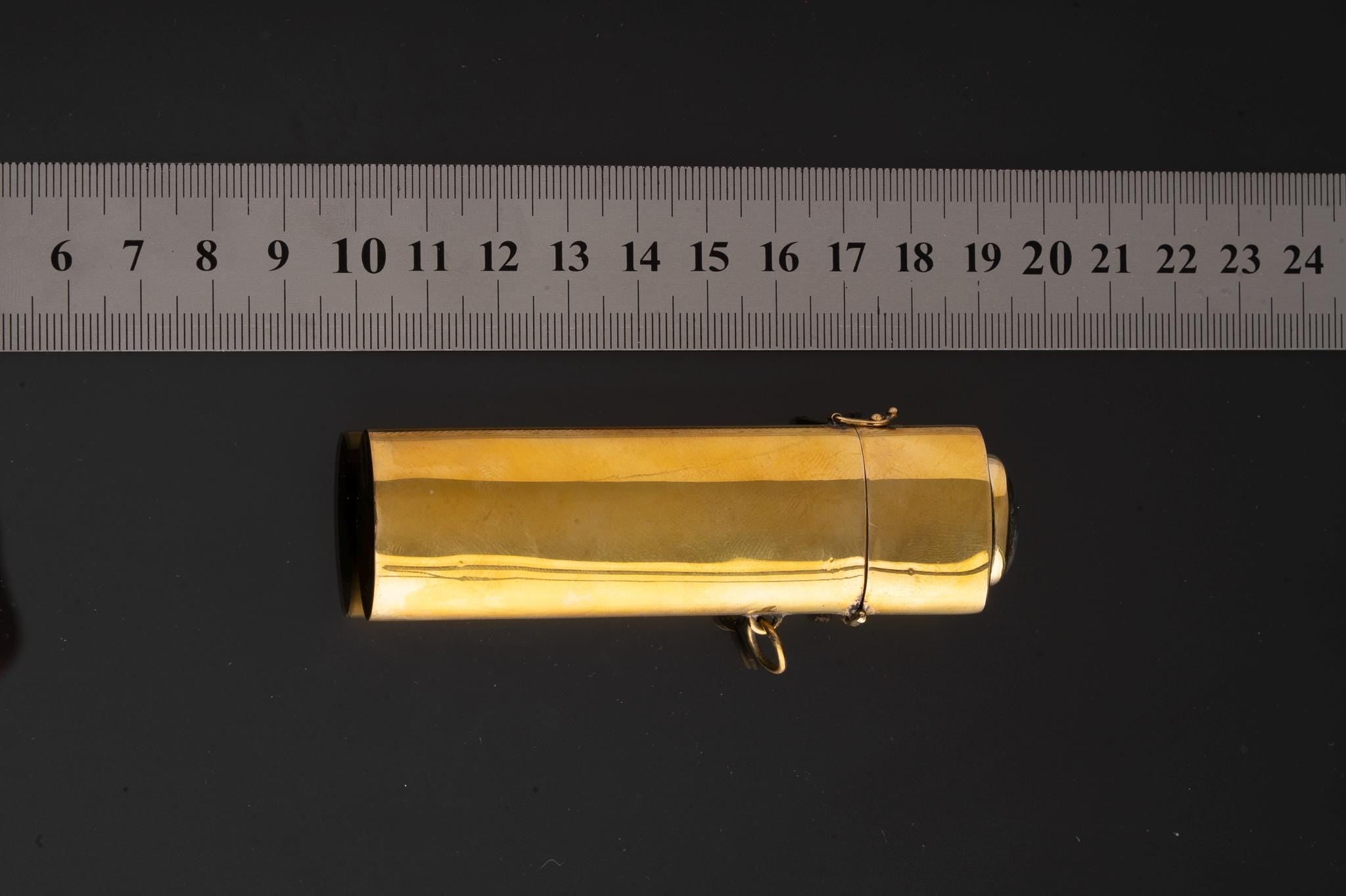Labradorite brass lighter box pendant shown beside a ruler for scale, with approximately 9 cm functional pendant body.