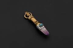 Overhead view emphasizing the brass Buddha casting, oxidized patina, and silver bezel finish.