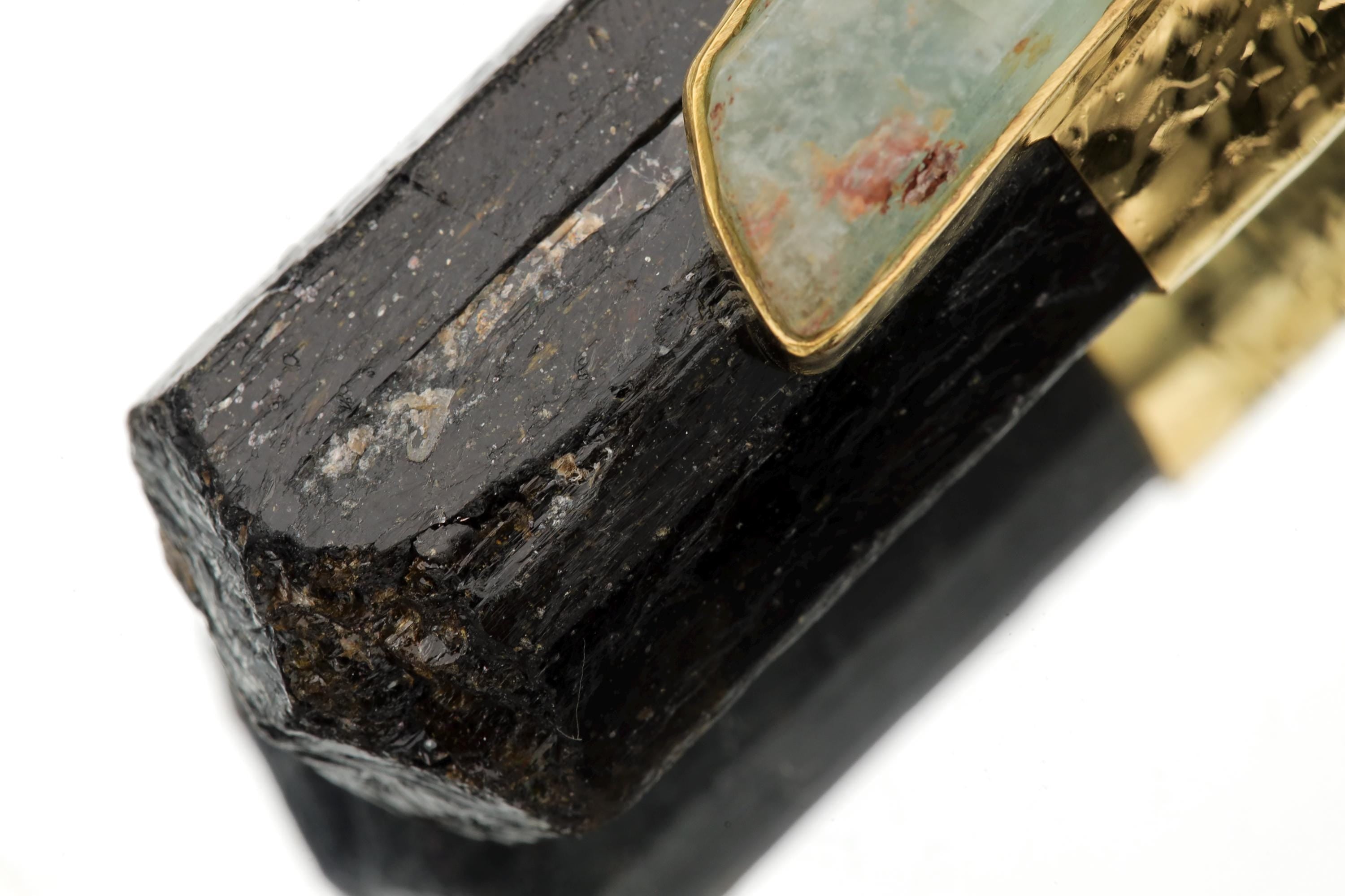Close-up of naturally terminated Gemmy Black Tourmaline Finger Point in an 18k gold-plated talisman pendant.
