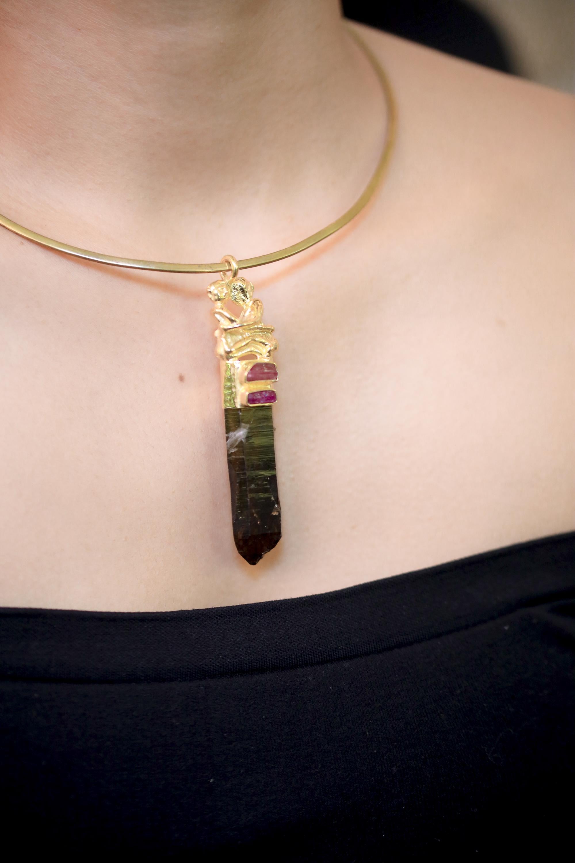 Pendant worn on model chest showing full pendant length, deep tone of smoky quartz, and warm gold plating glow.