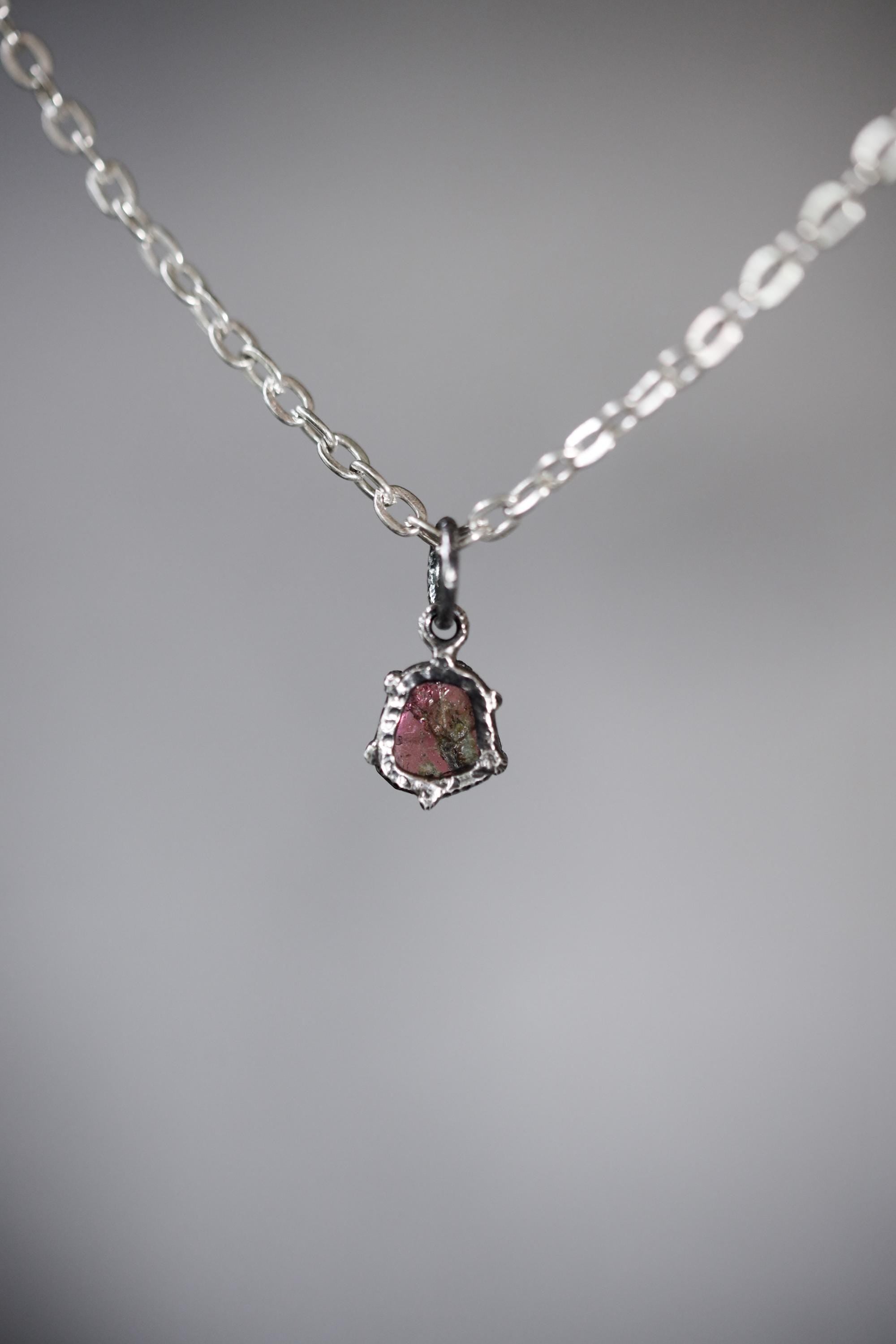 Polished slice of Natural Pink Tourmaline (Rubellite) wand with Darker Rind Pendant, Sterling Silver Claw Setting, Oxidized Hammer Finish