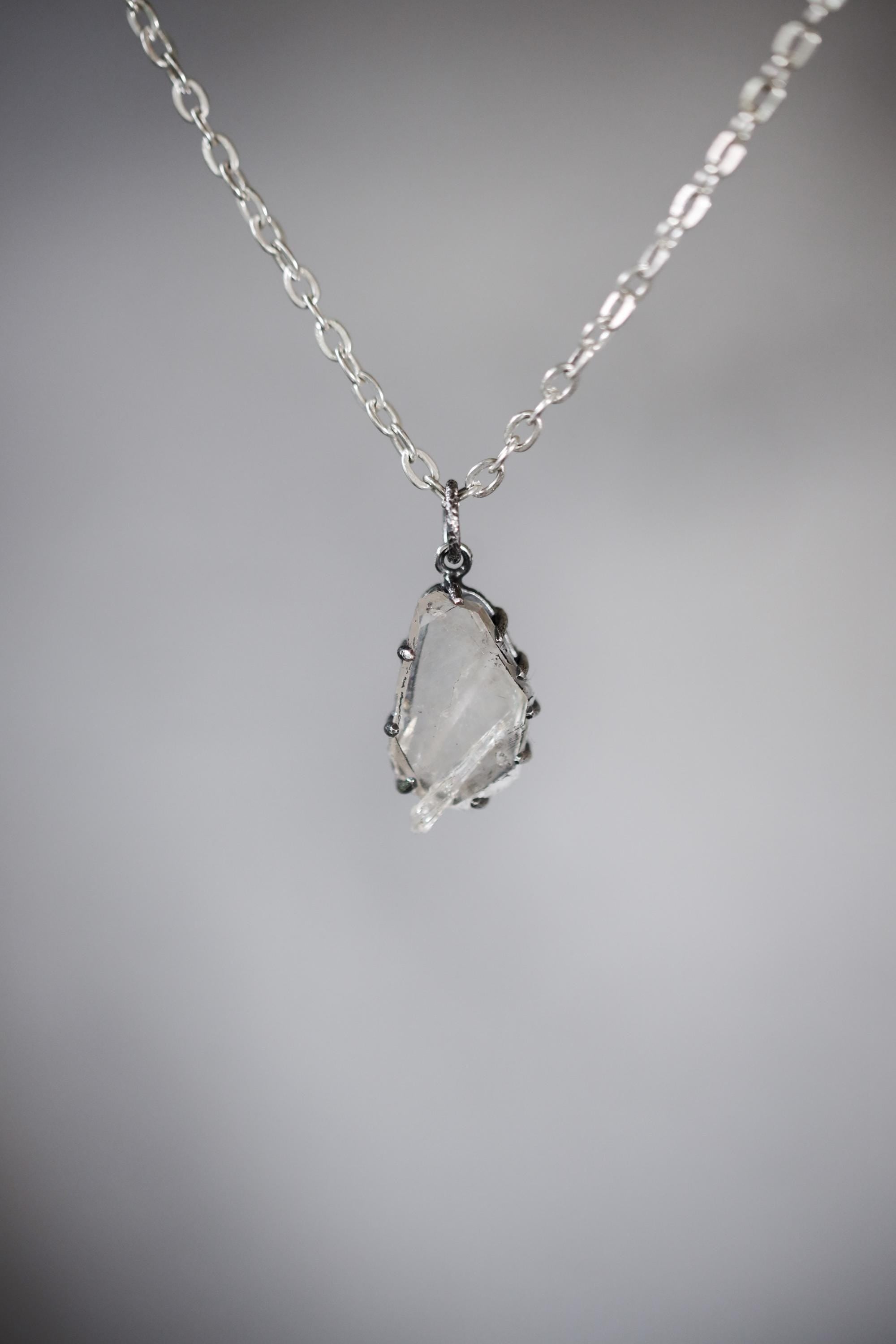 Faden Quartz Pendant: Raw Crystal, Hammered Sterling Silver