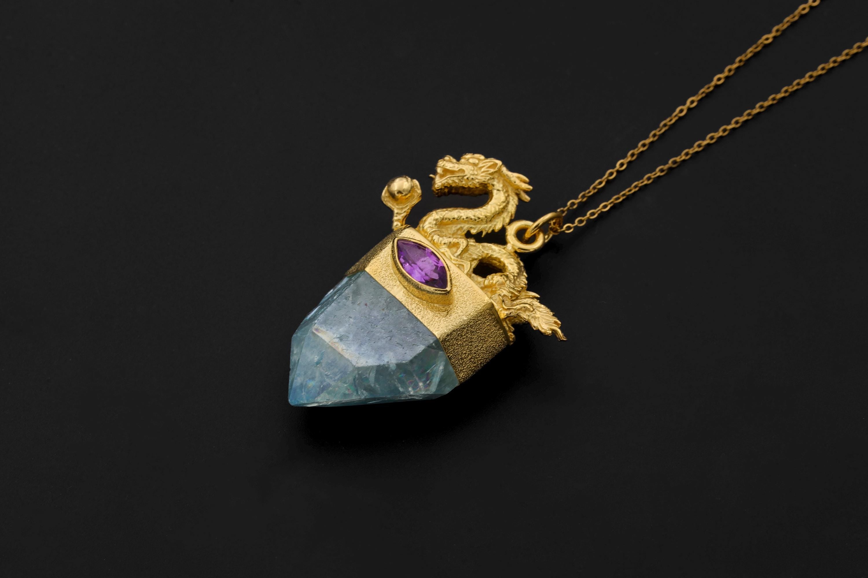 Overhead view emphasizing clarity of Aqua Aura Quartz and luster of faceted surfaces.