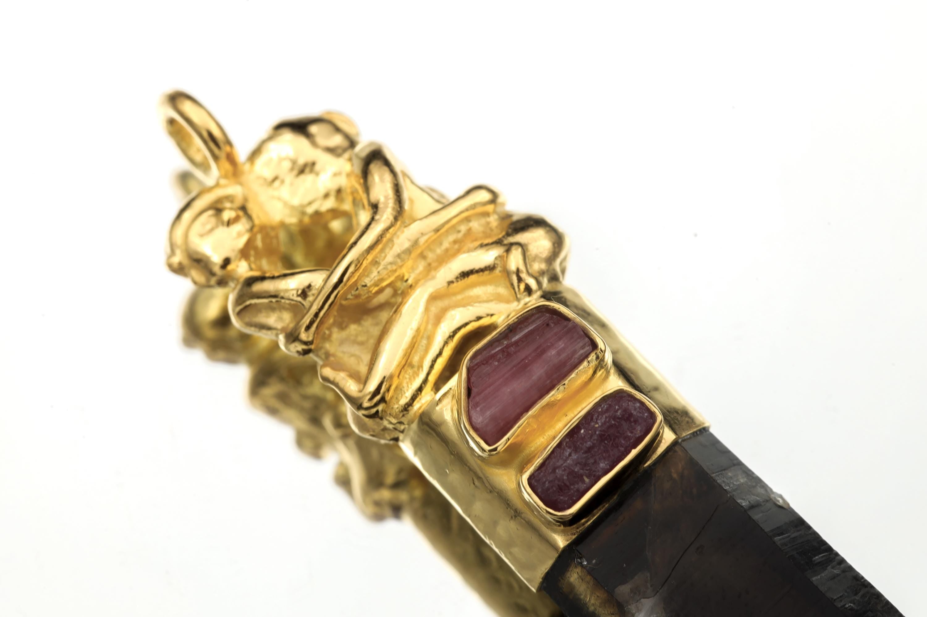 Detailed macro of couple casting showing hand-sculpted texture and organic surface form.