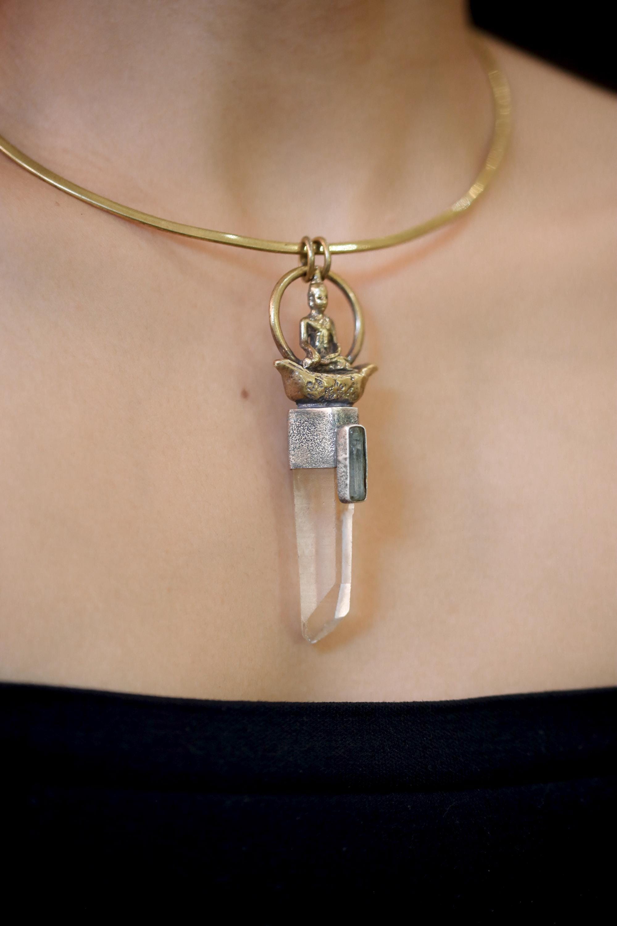 Side macro shot focusing on Aquamarine stone structure and oxidized patina around bezel edges.