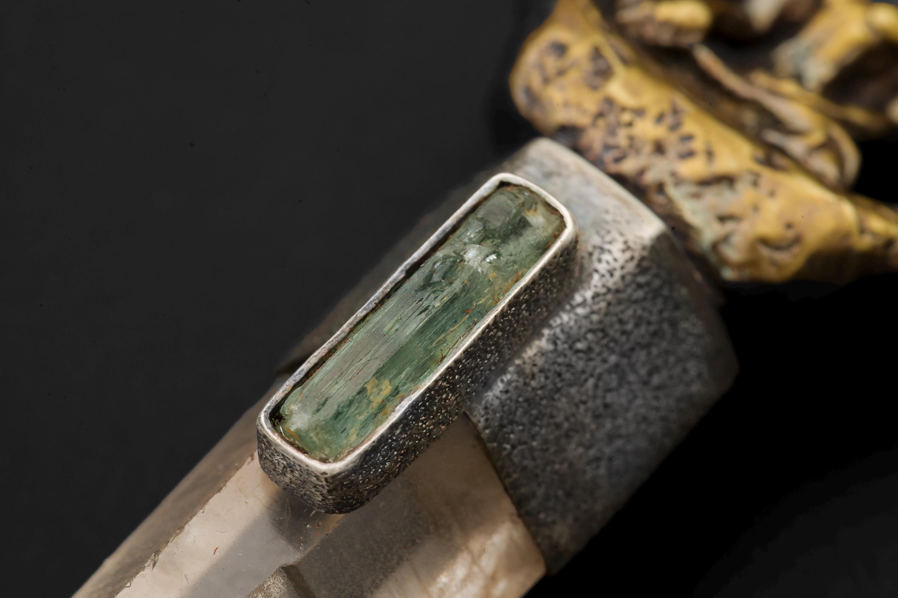 Close-up of Aquamarine gemstone revealing natural transparency and subtle sea-green tone.