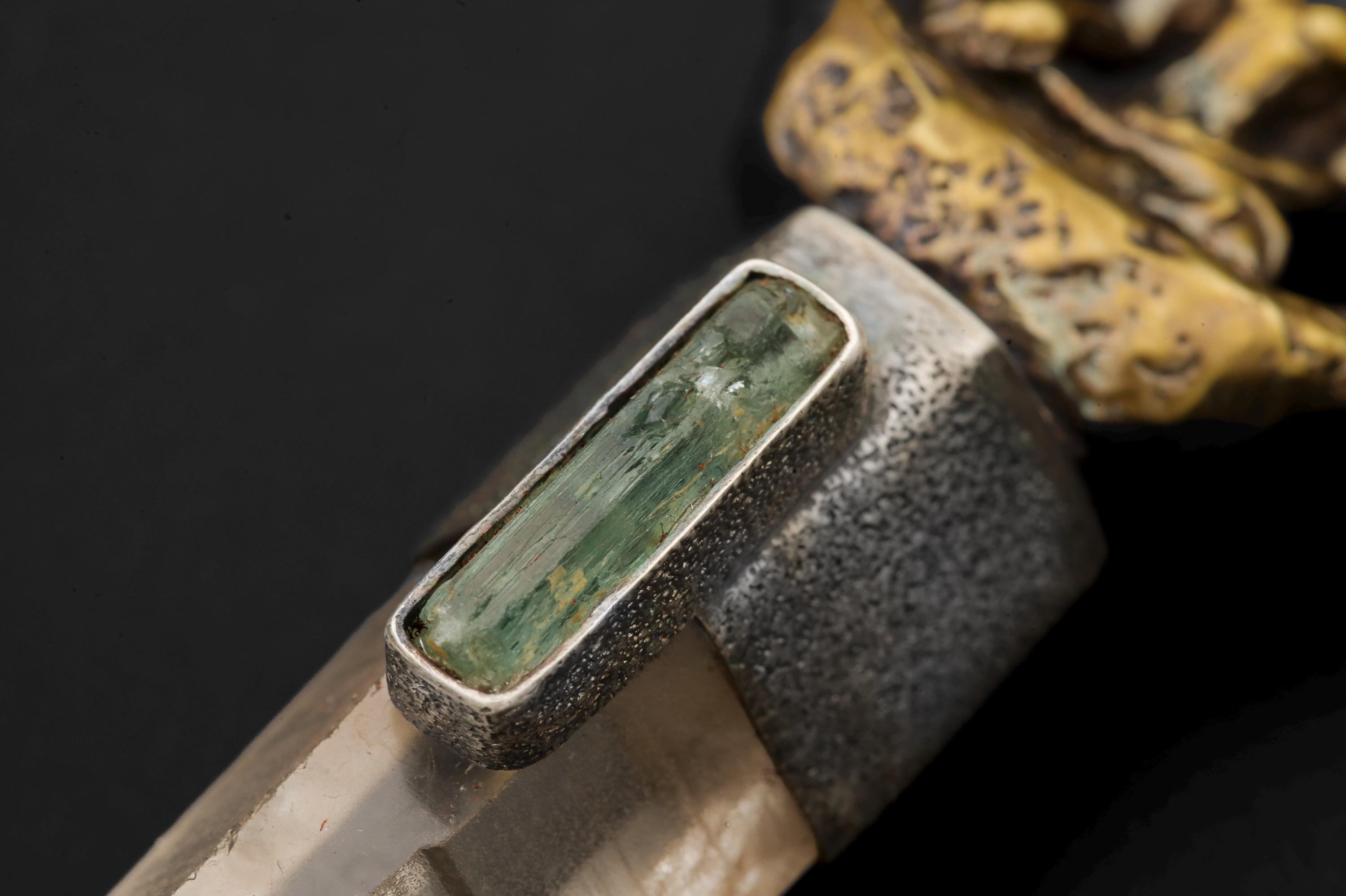 Close-up of Australian Aquamarine and Lemurian Window Quartz in a sand-textured oxidized silver pendant setting.