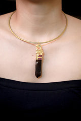 Pink Tourmaline Ruby Smoky Quartz Talisman Pendant on white background featuring cast brass Loving Couple sculpture above natural smoky quartz point, gold-plated with 925 silver bezel and pink rubellite tourmaline accent.