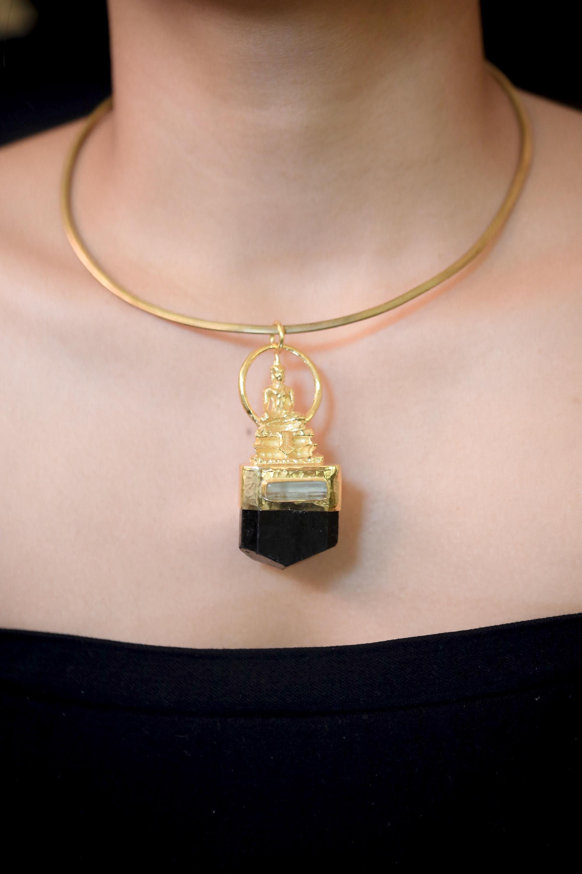 Macro photo highlighting tourmaline’s natural texture, sharp facets, and mirror-like polish under diffused light.