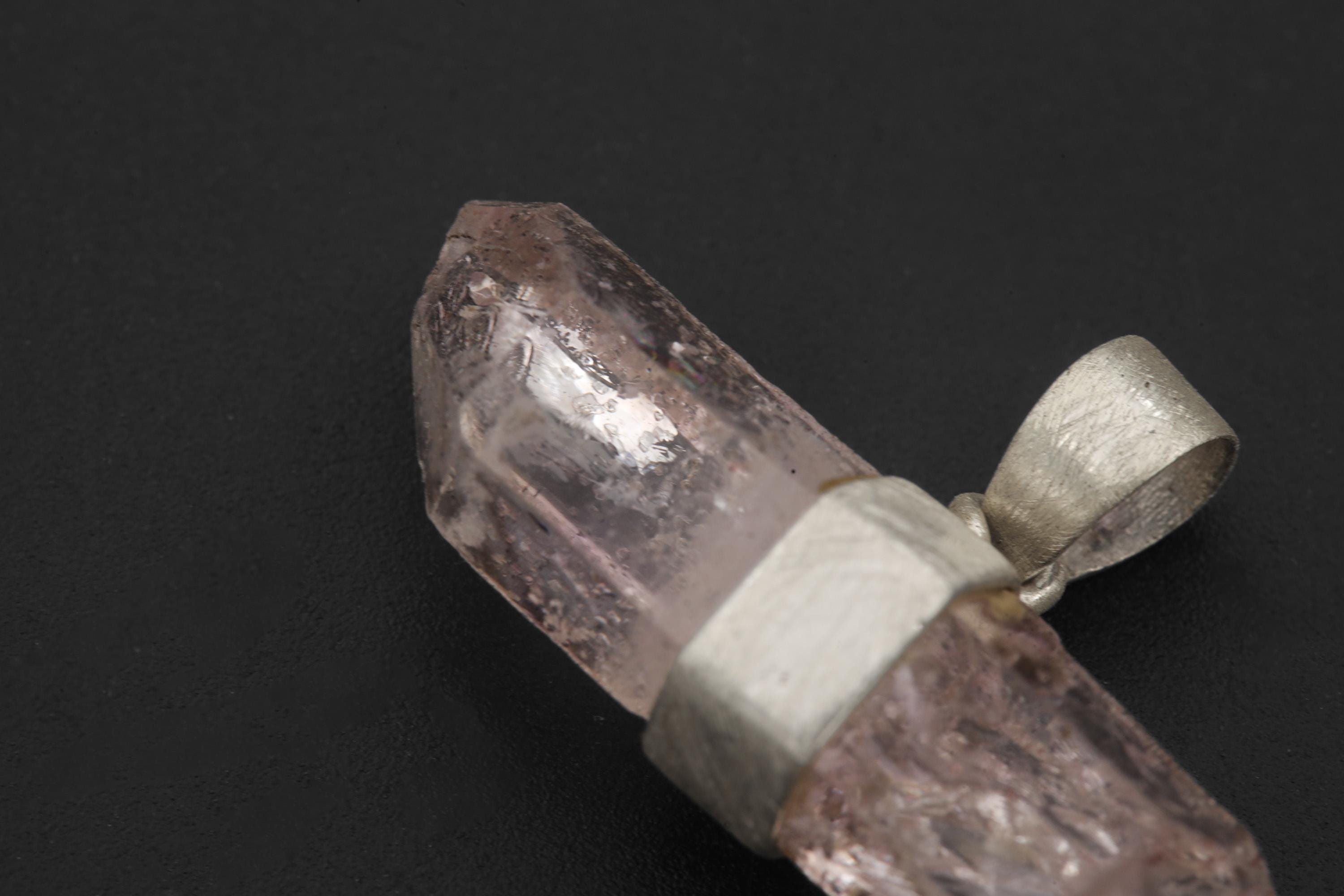 Close view of pale lilac Anhydro Vera Cruz Amethyst pendant with brushed silver wrap.
