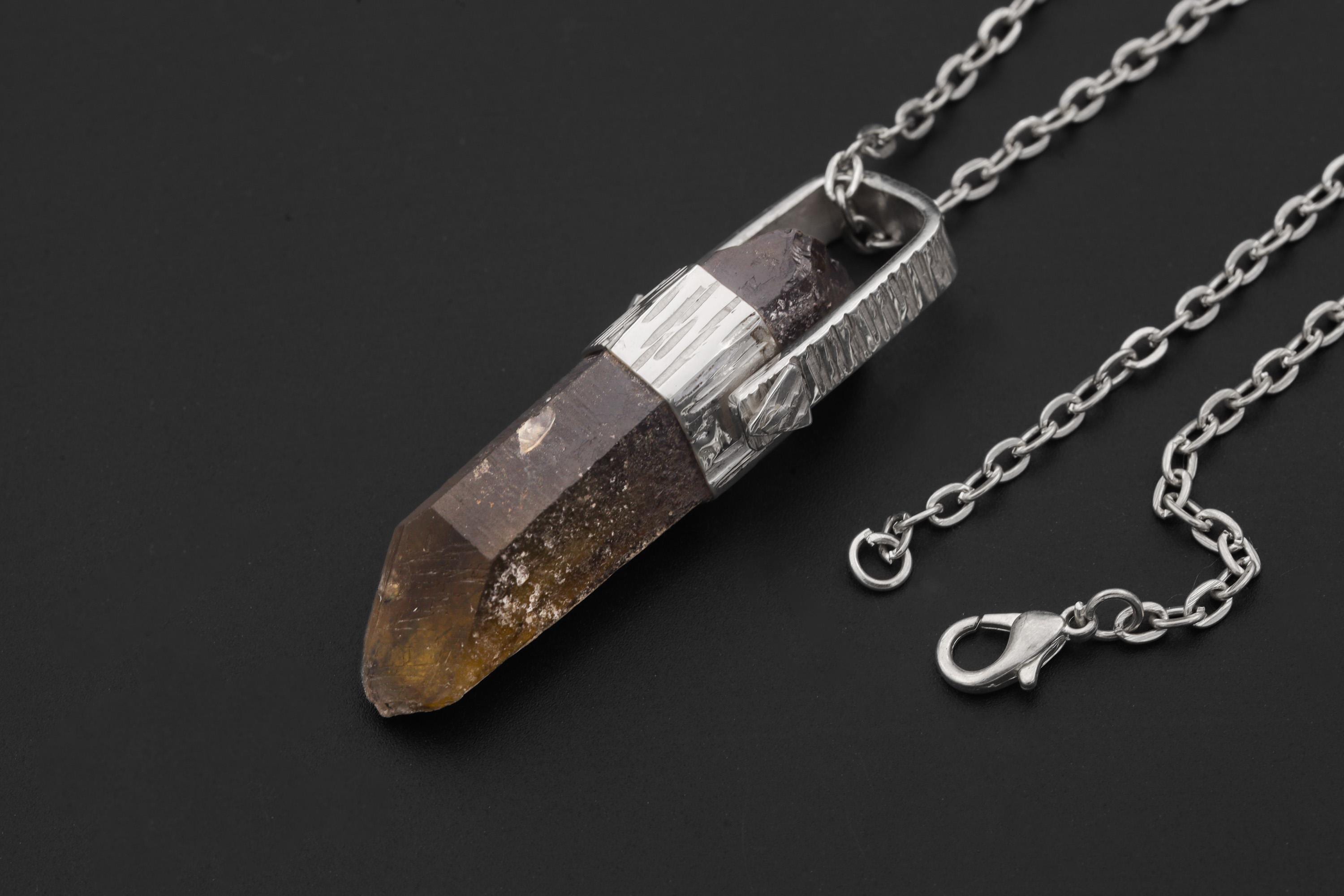 Australian Record Keeper Citrine Quartz pendant shown on black background with chain, high-polish sterling silver wrap, and golden crystal point.