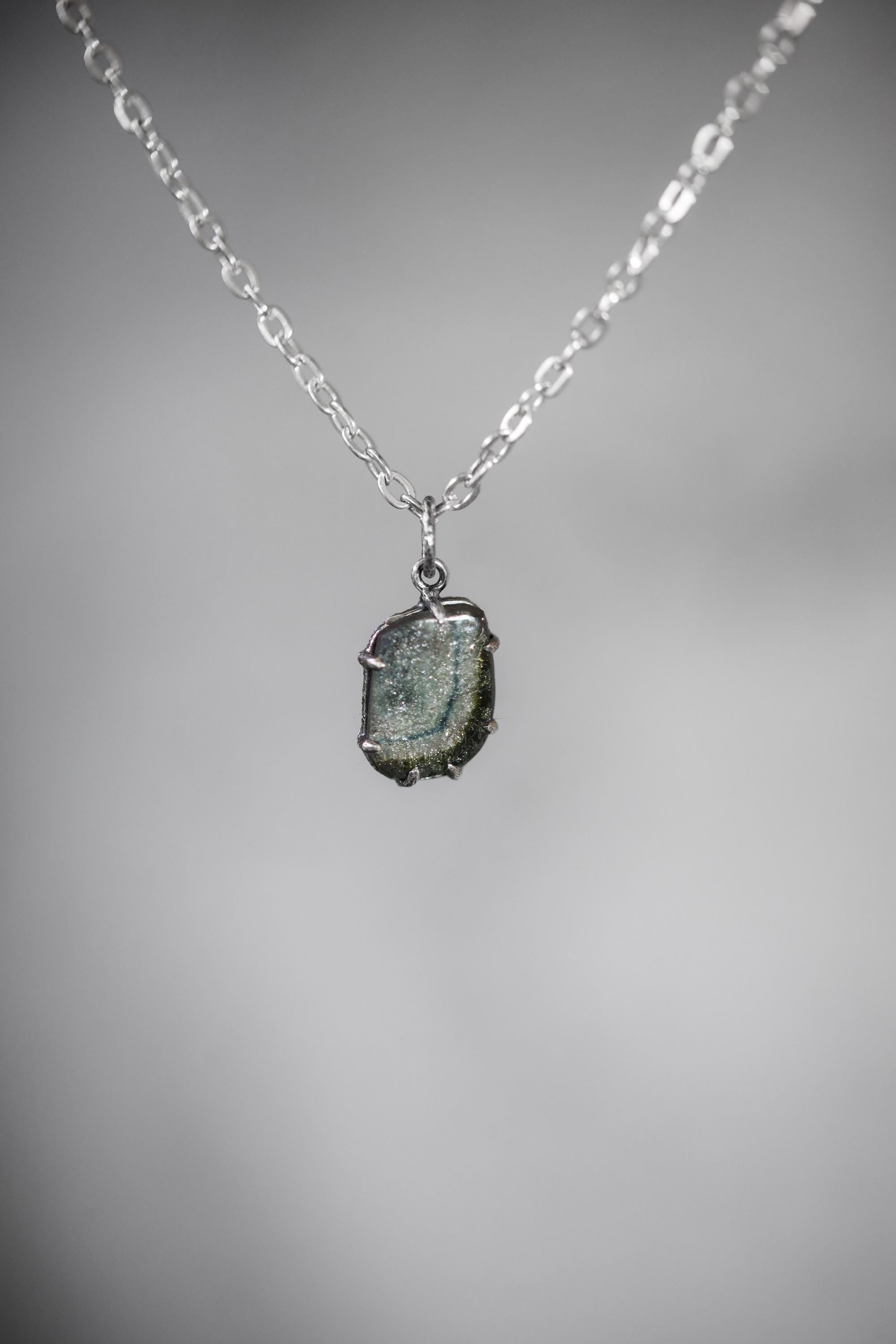 Polished Slice of Natural Green Blue Tourmaline Wand with Darker Rind Pendant, Sterling Silver Claw Setting, Oxidized, Hammered Textured