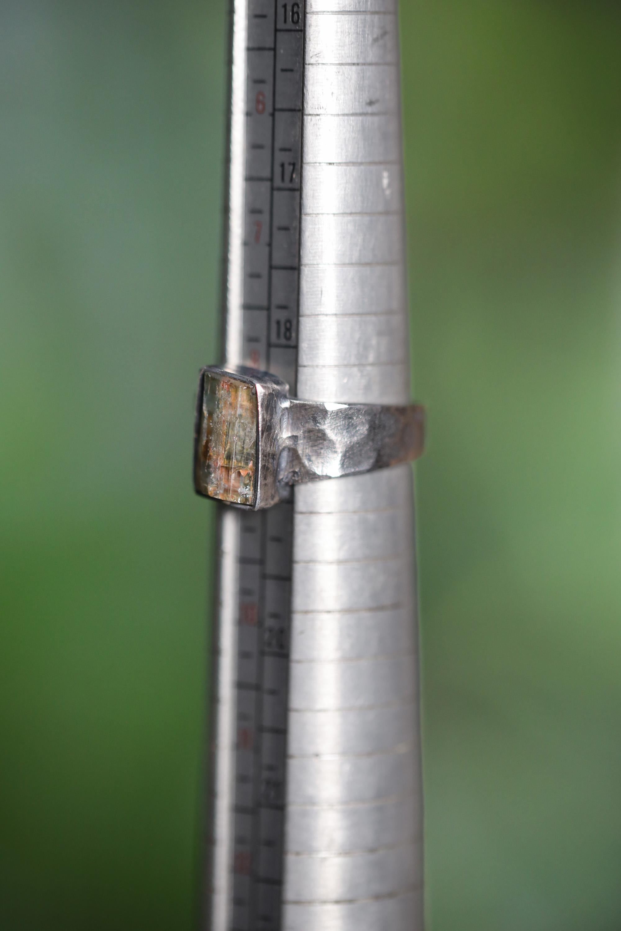 Australian Aquamarine men’s ring shown beside a ruler for scale, with oxidized hammered sterling silver and square stone.