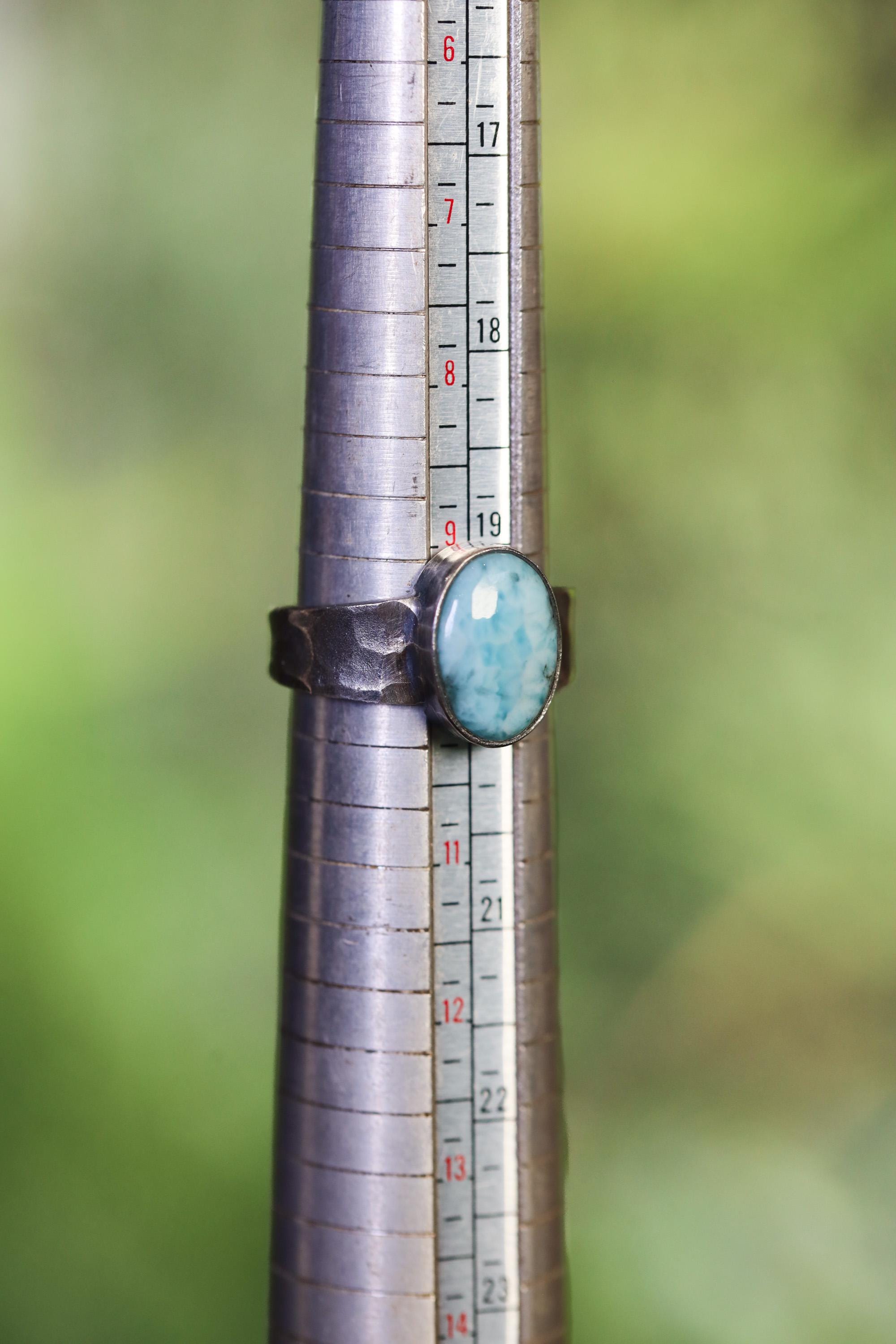 AAA Larimar sterling silver ring shown on mandrel for men’s US size 10 reference.