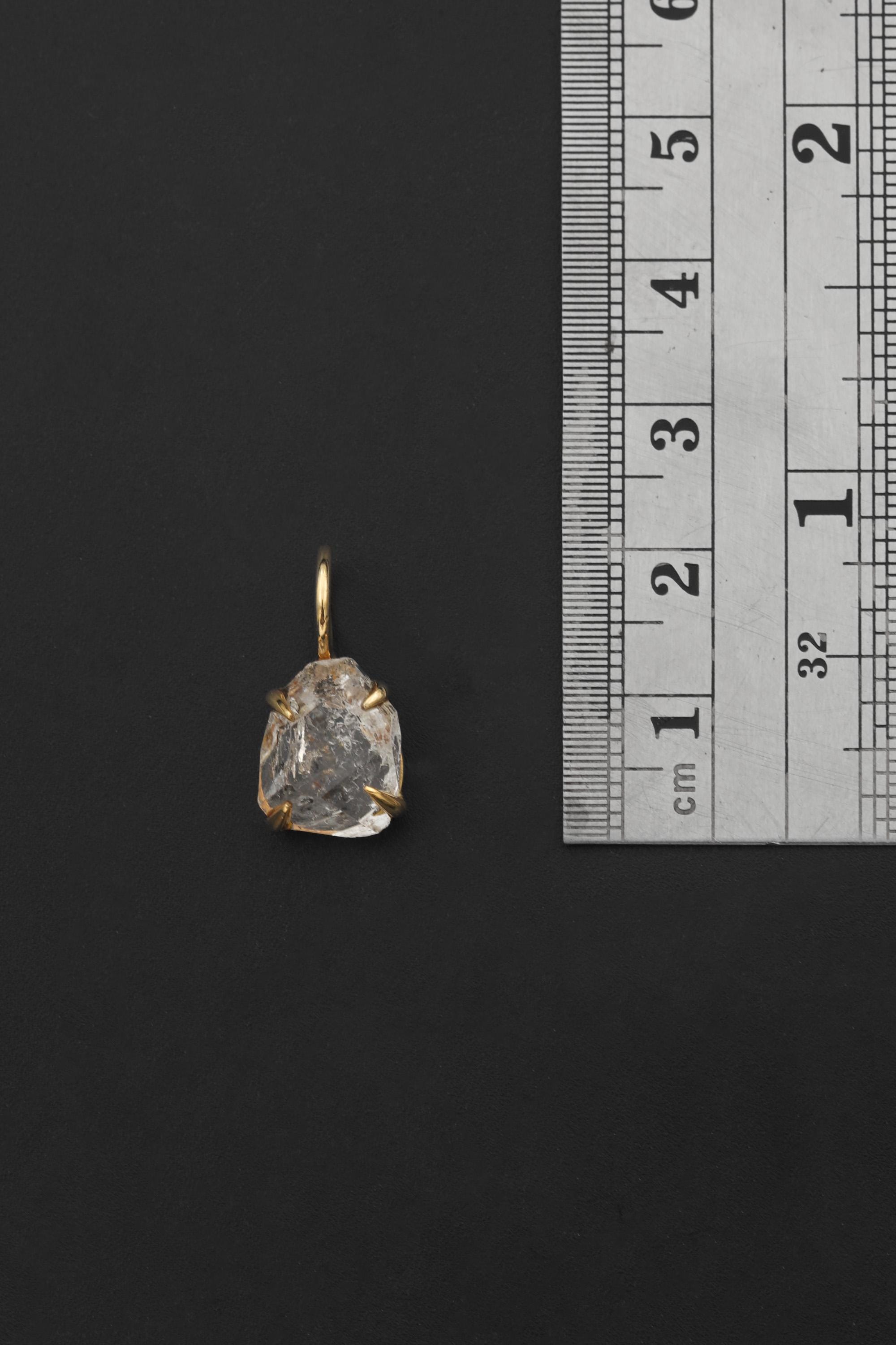 Herkimer Diamond Quartz pendant shown beside ruler for petite 2.5 cm size reference.
