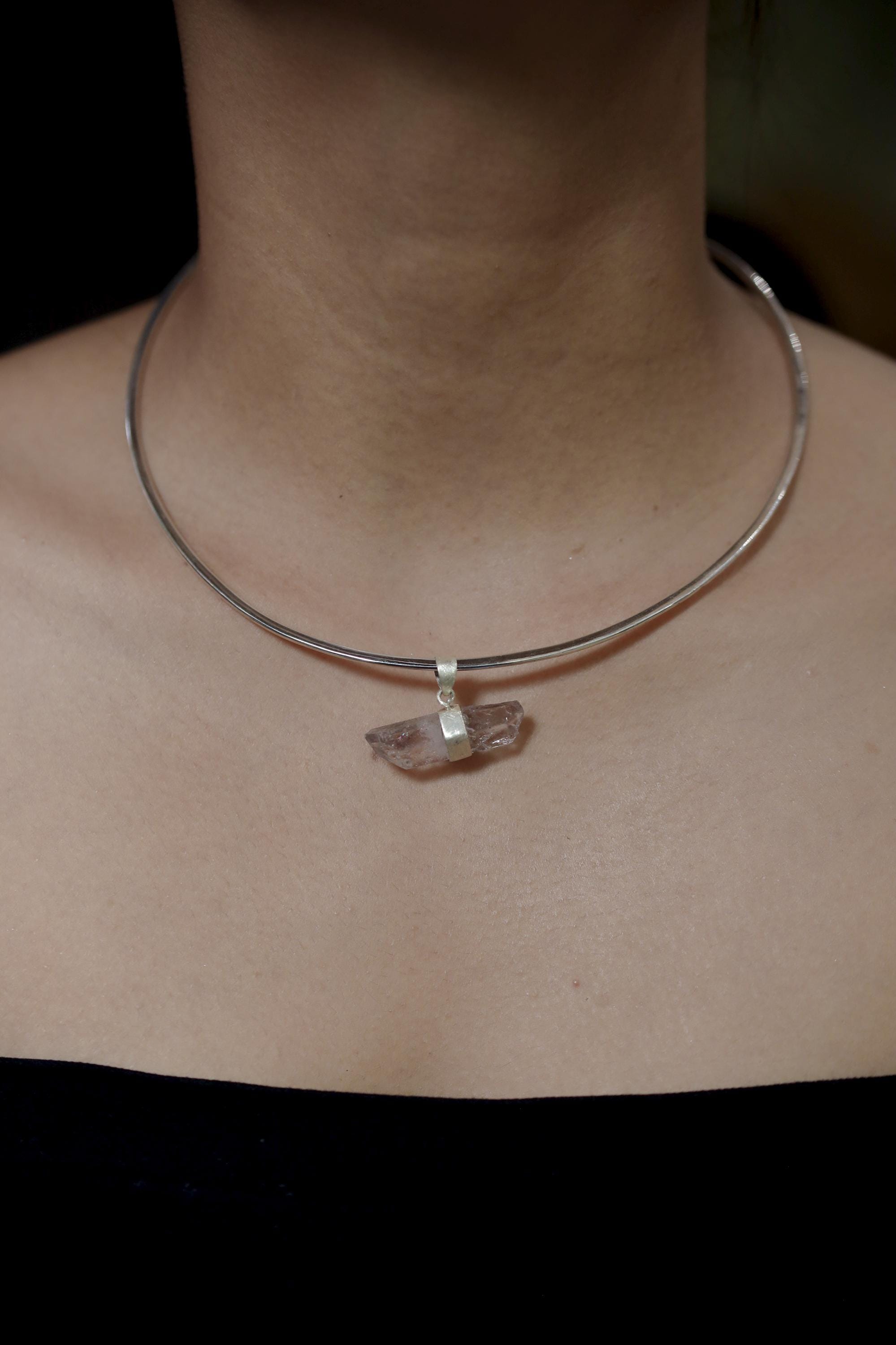 Double terminated Anhydro Amethyst pendant worn on silver chain as a delicate crystal necklace.