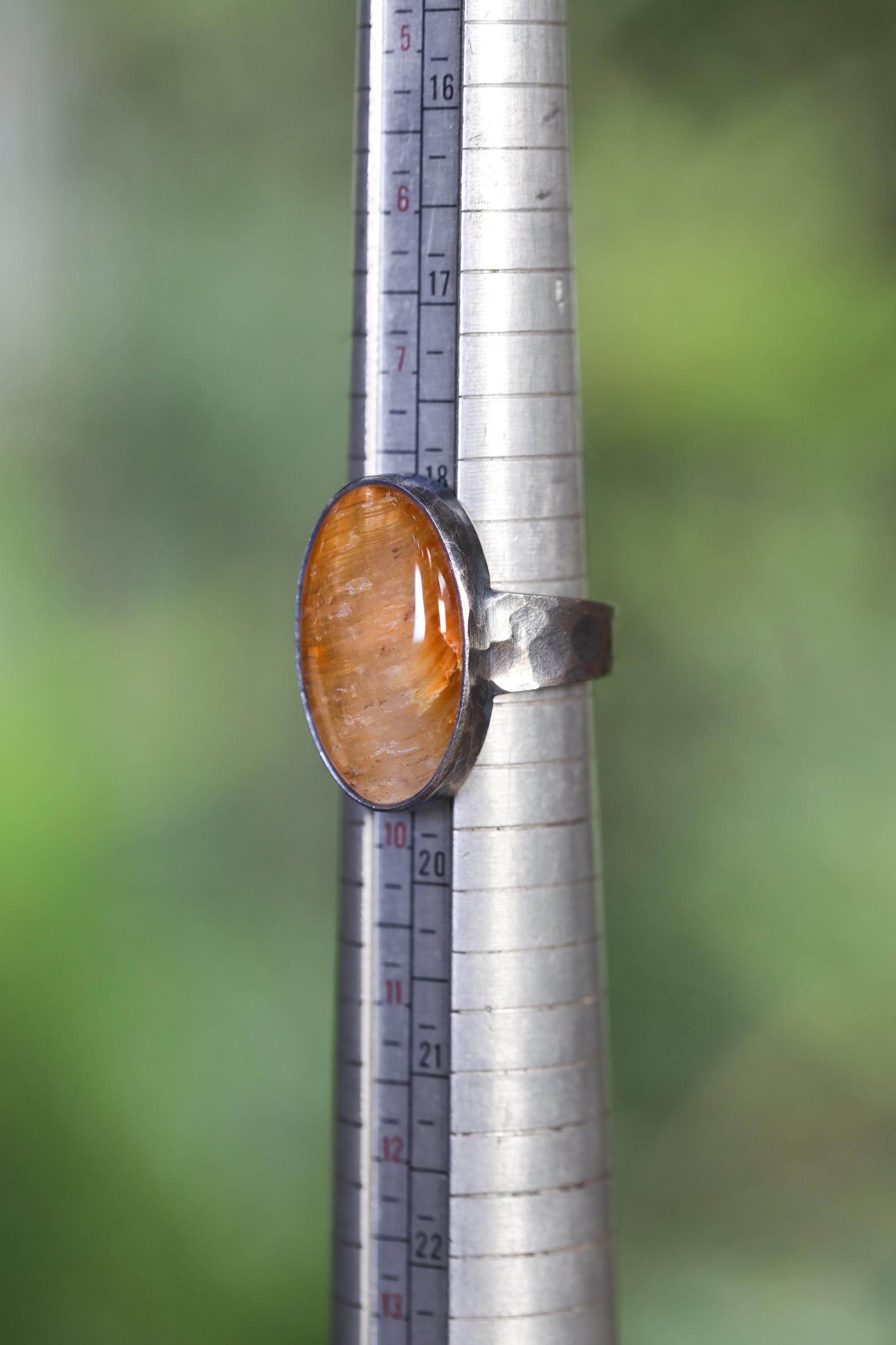 Gold Rutilated Quartz sterling silver ring shown on mandrel for men’s US size 9 reference.