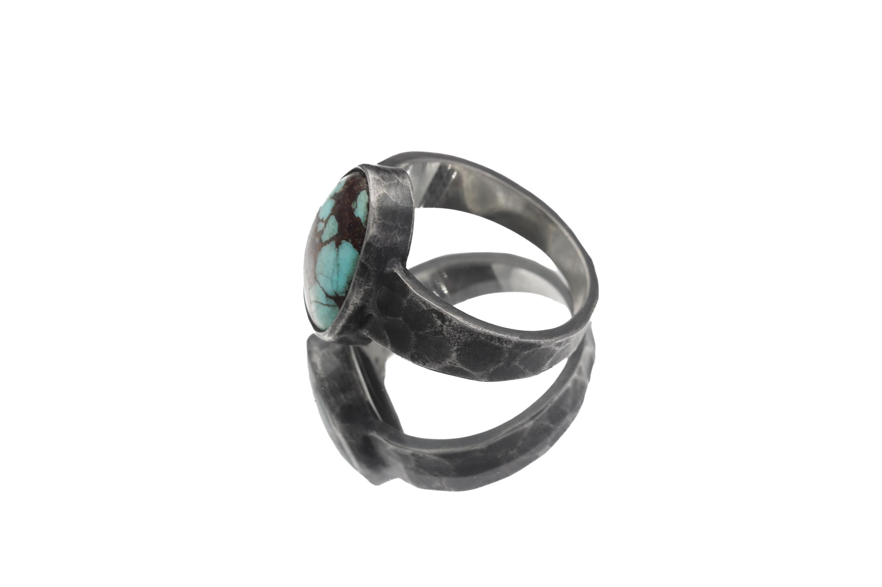 Side view of Old World Tibetan Turquoise ring showing low-profile bezel and hammered oxidized sterling silver band.