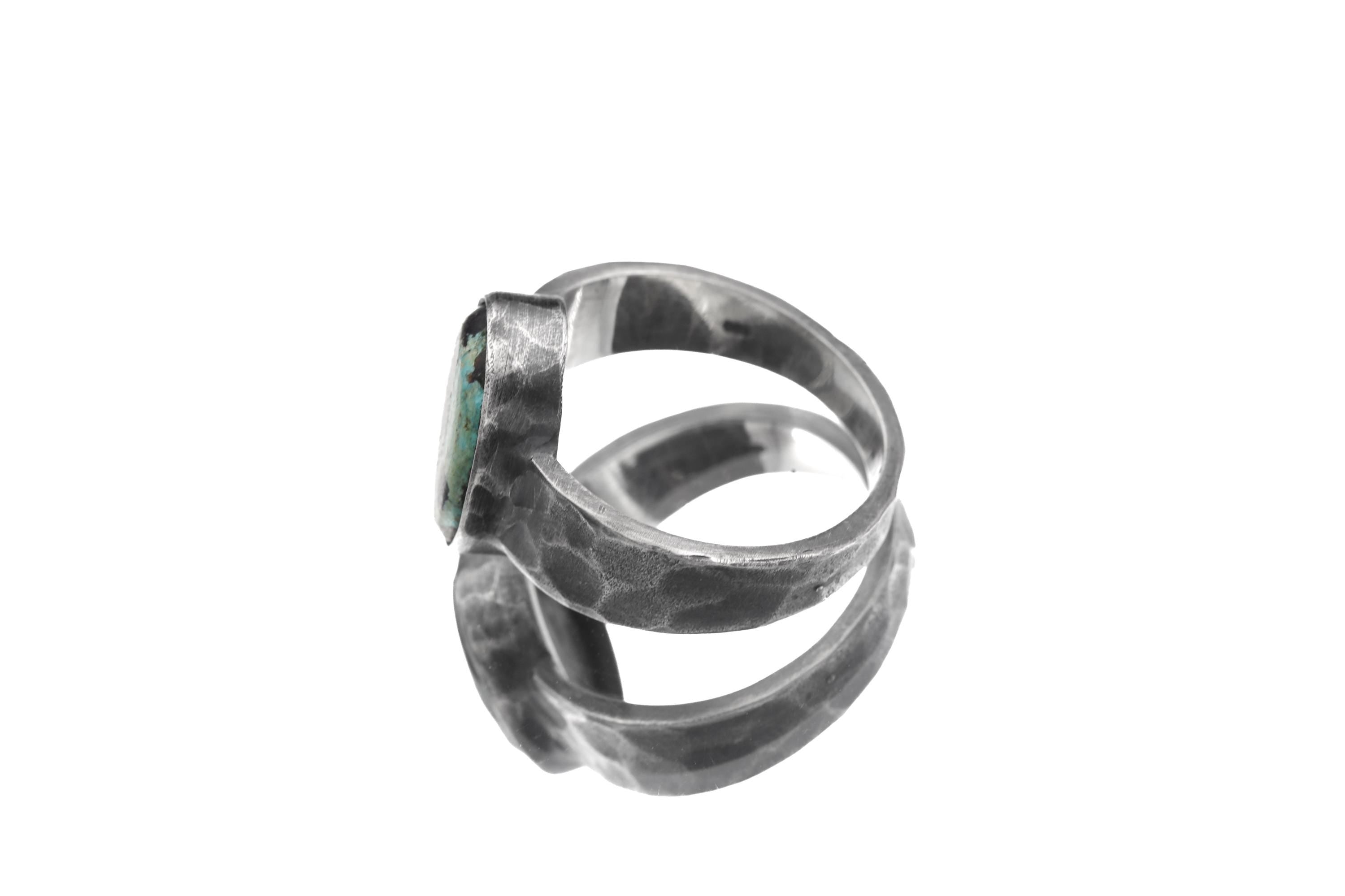 Side view of Old World Tibetan Turquoise ring showing wide hammered sterling silver band and thick bezel setting.