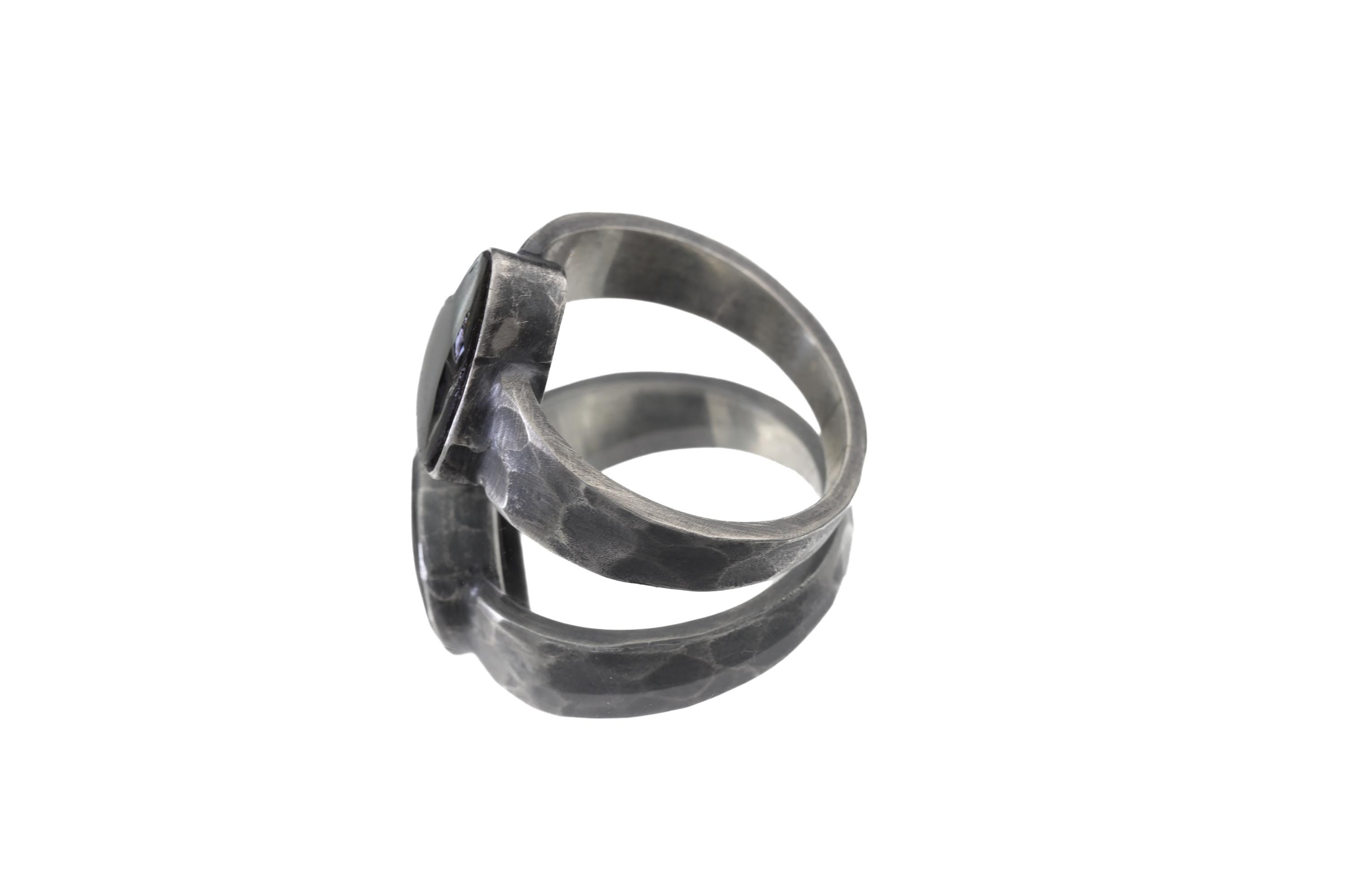 Side view of Green Tourmaline slice ring showing hand-shaped deep bezel and wide oxidized sterling silver band.