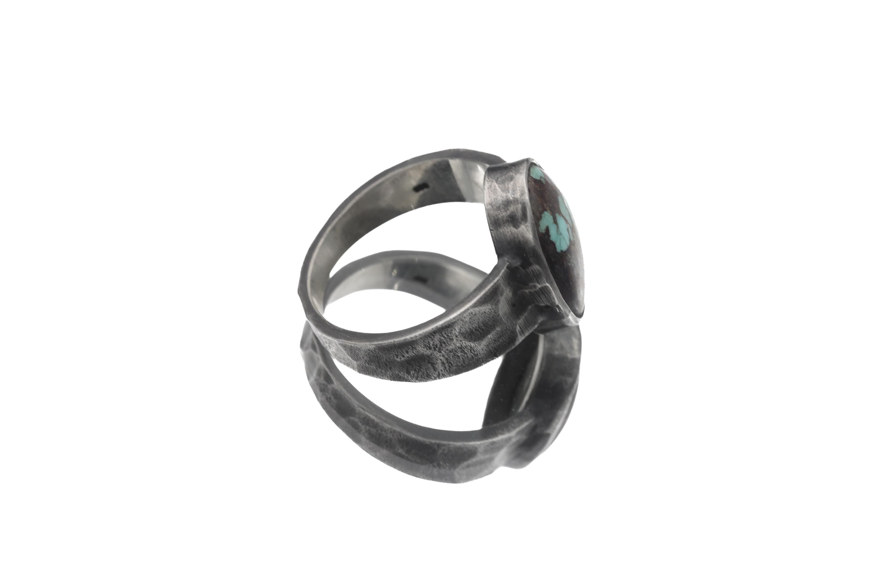 Side view of Old World Tibetan Turquoise ring showing low-profile bezel and hammered oxidized sterling silver band.