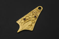 Gold-plated Double Garnet pendant displayed on black background with organic abstract form.