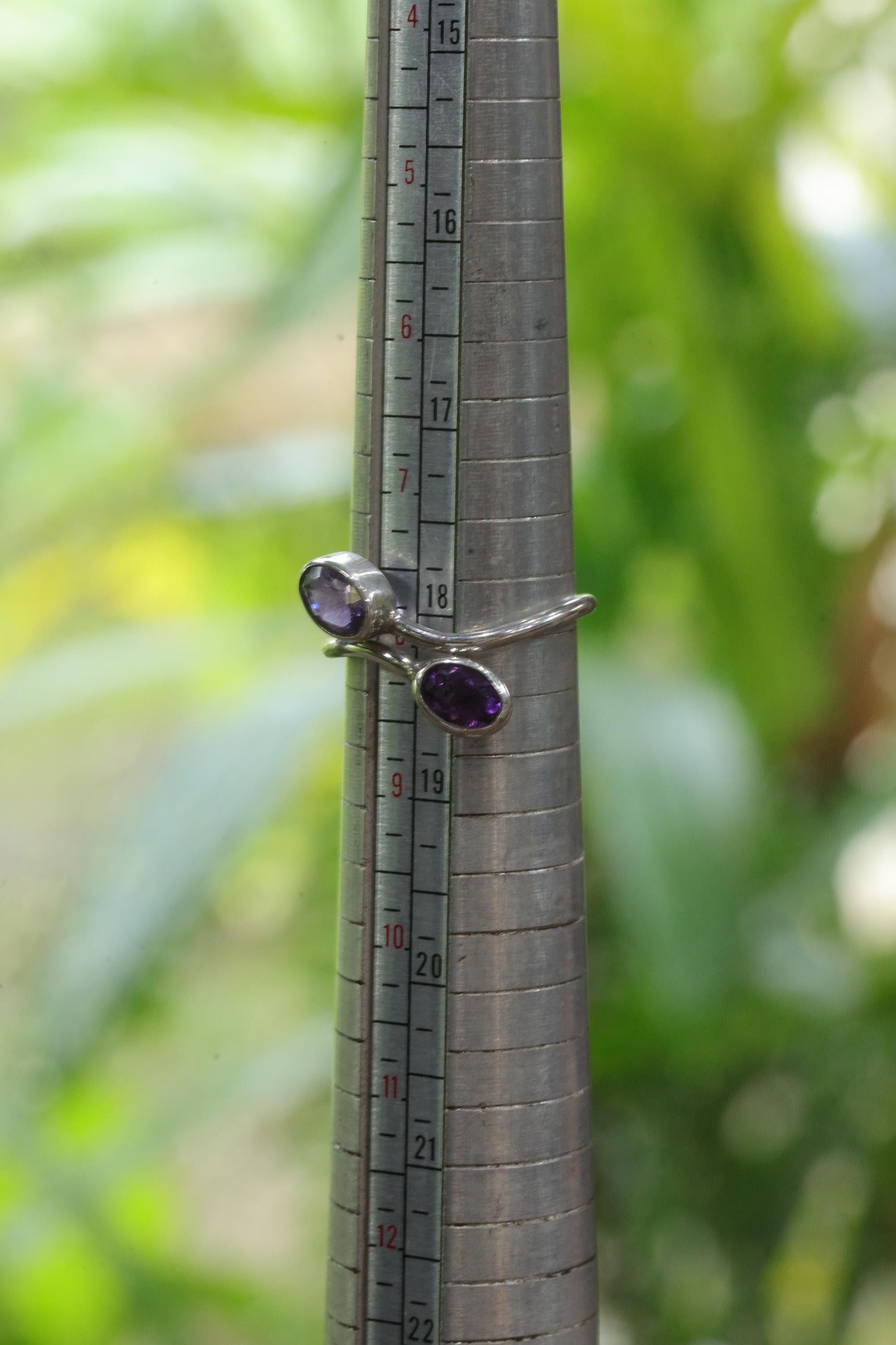 Twin Amethyst sterling silver ring shown on mandrel for approximate ring size reference.