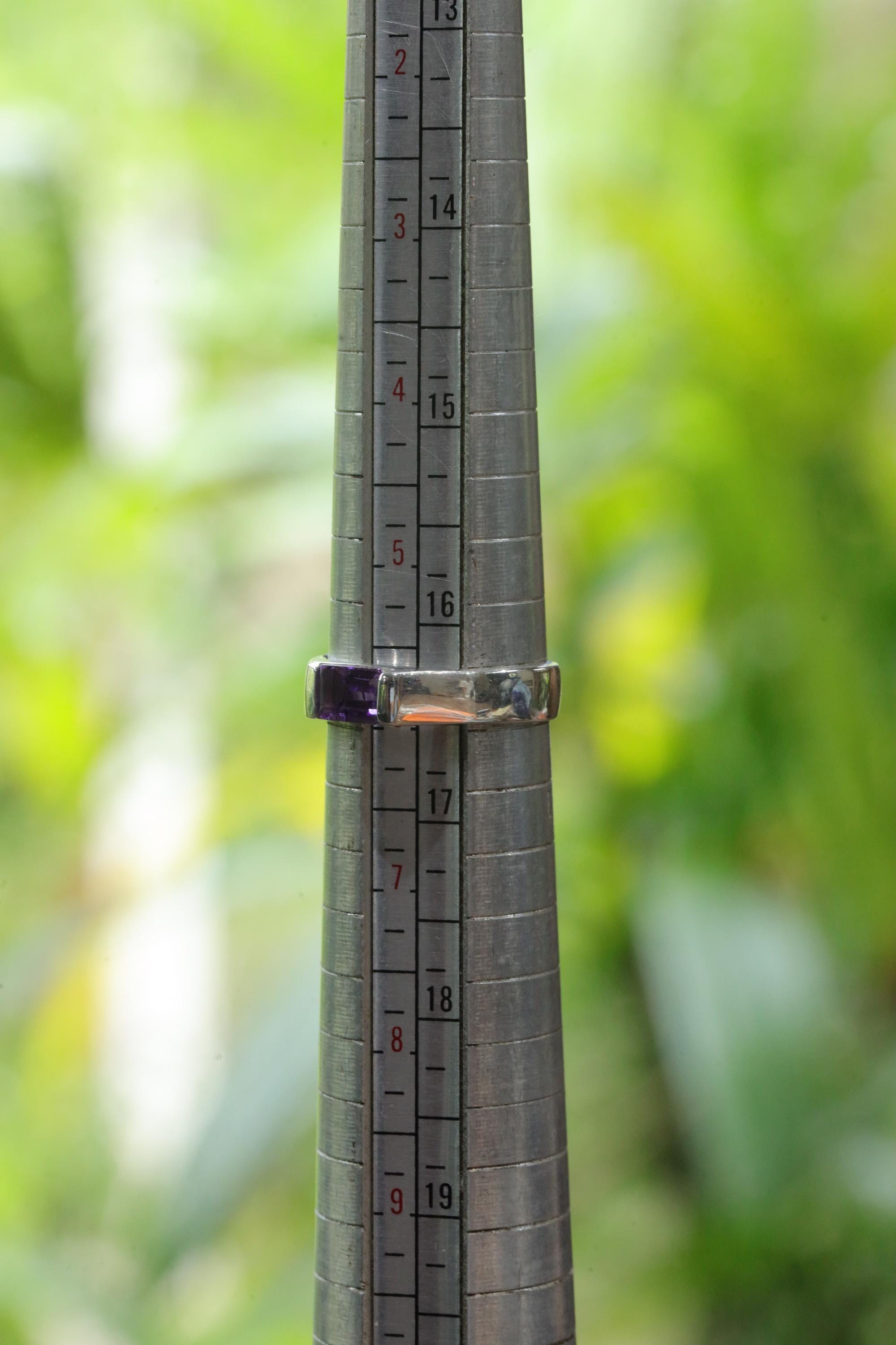 Octagon Amethyst sterling silver ring shown on mandrel for approximate ring size 6 US reference.