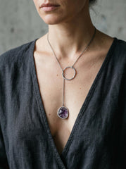 Raw Amethyst oxidized sterling silver lariat necklace shown worn with long adjustable loop design.