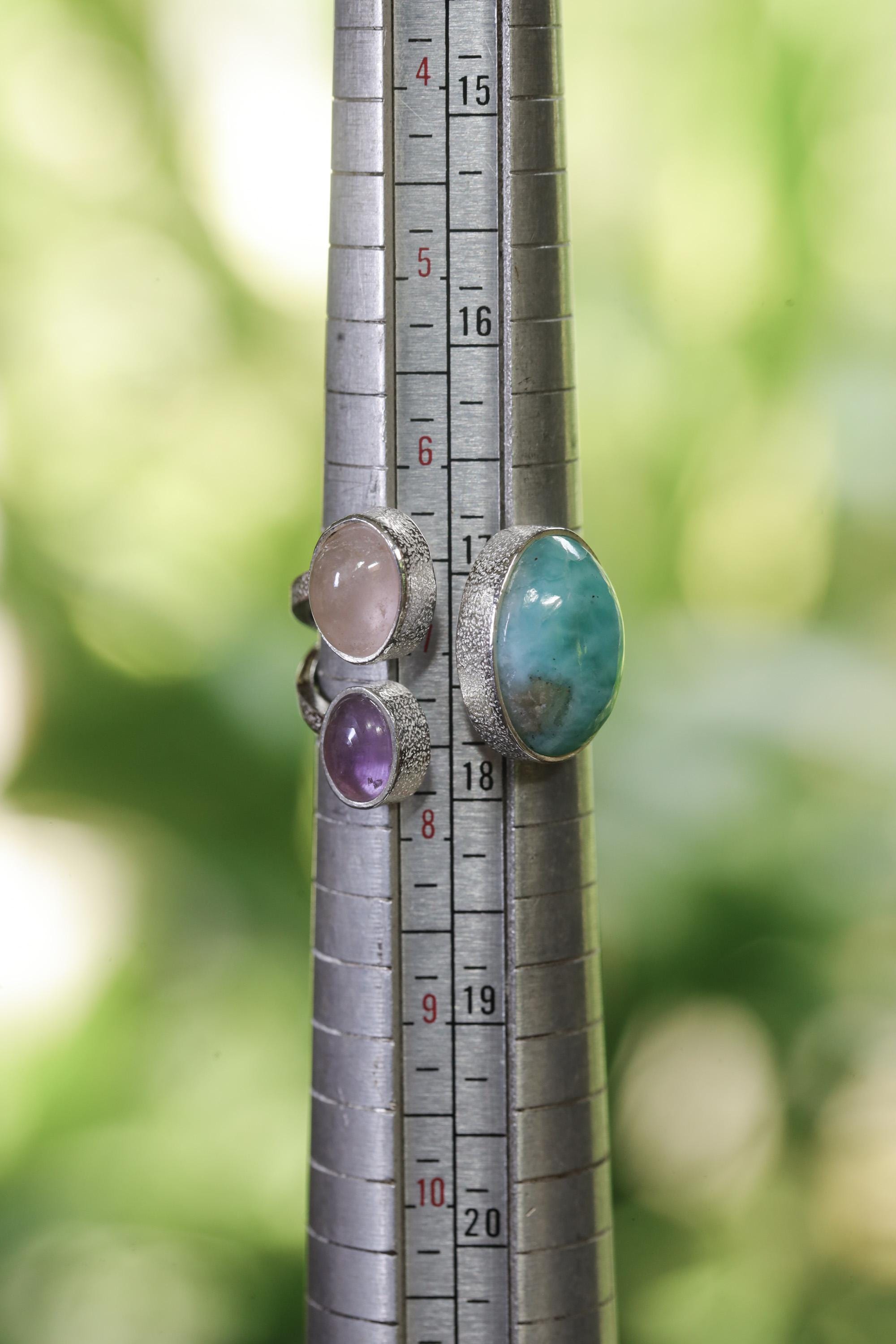 Ocean Heart Multi Stone Ring shown beside a ruler for scale with Larimar, Amethyst, Rose Quartz, and open silver band.