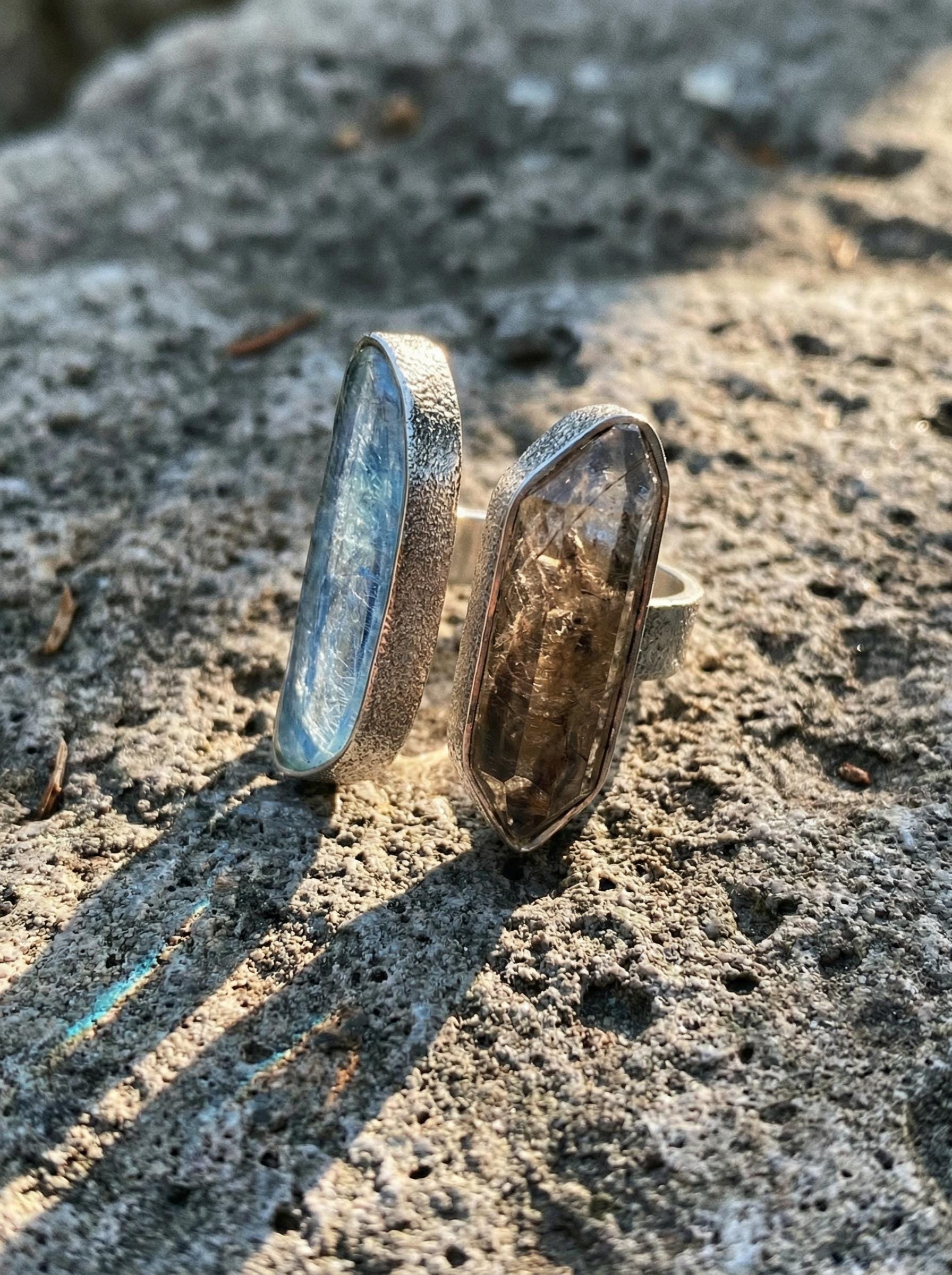 Close-up of Morella Smoky Quartz and Aquamarine Ring showing dark translucent Quartz and ocean-blue Aquamarine.