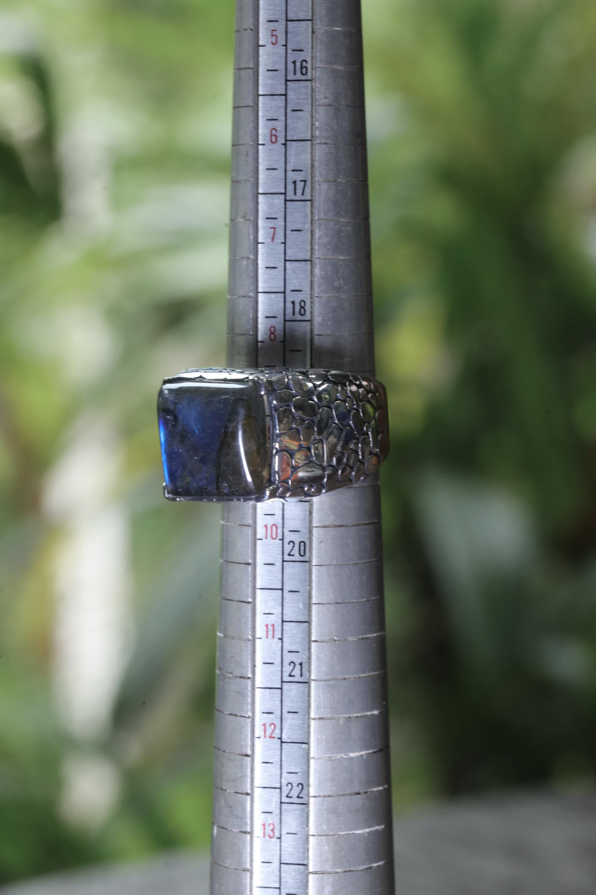 Labradorite sterling silver ring shown on mandrel for US size 9 reference.
