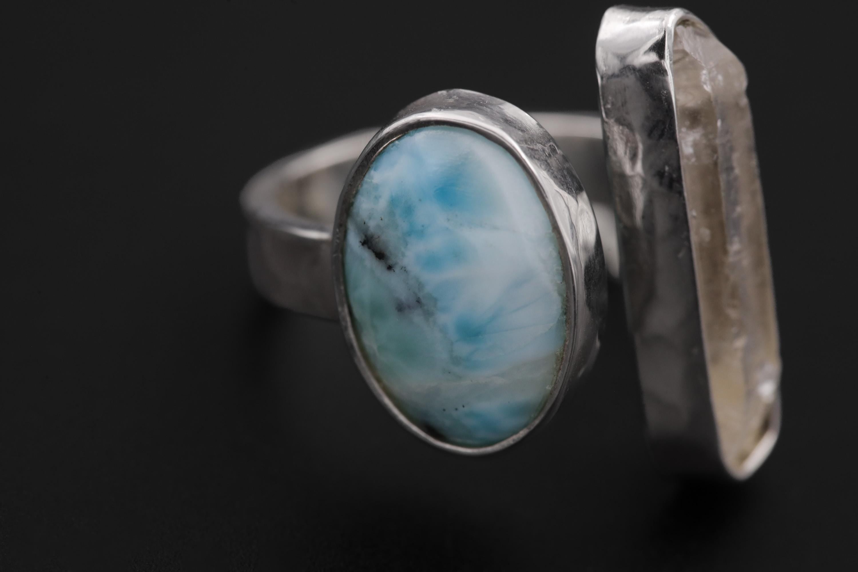 Close-up of Horizon Flow Quartz and Larimar Ring showing clear crystal texture and smooth ocean-blue cabochon.