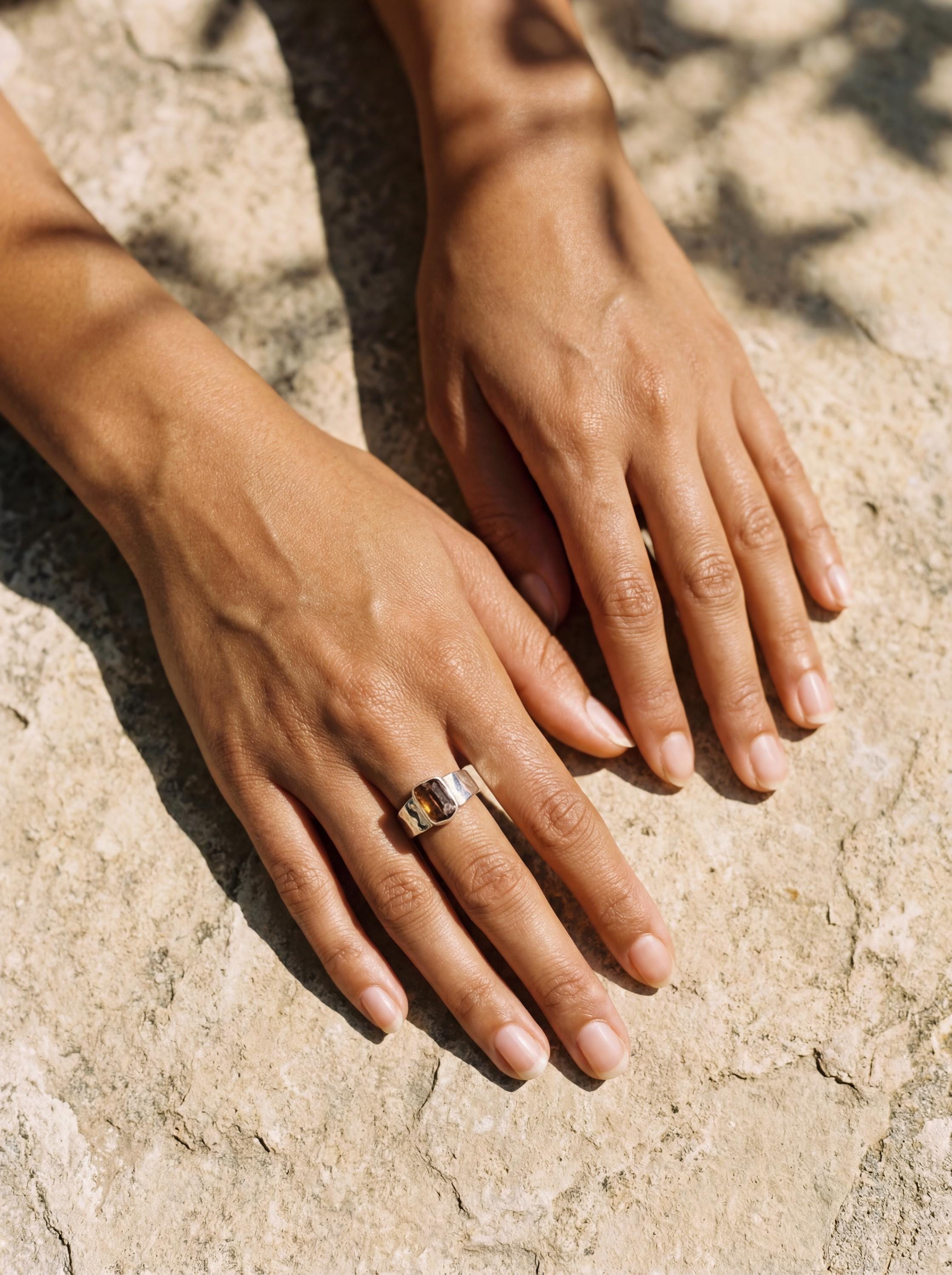 Brown Tourmaline Terminated Ring shown worn on hand with natural Dravite crystal and handmade sterling silver band.