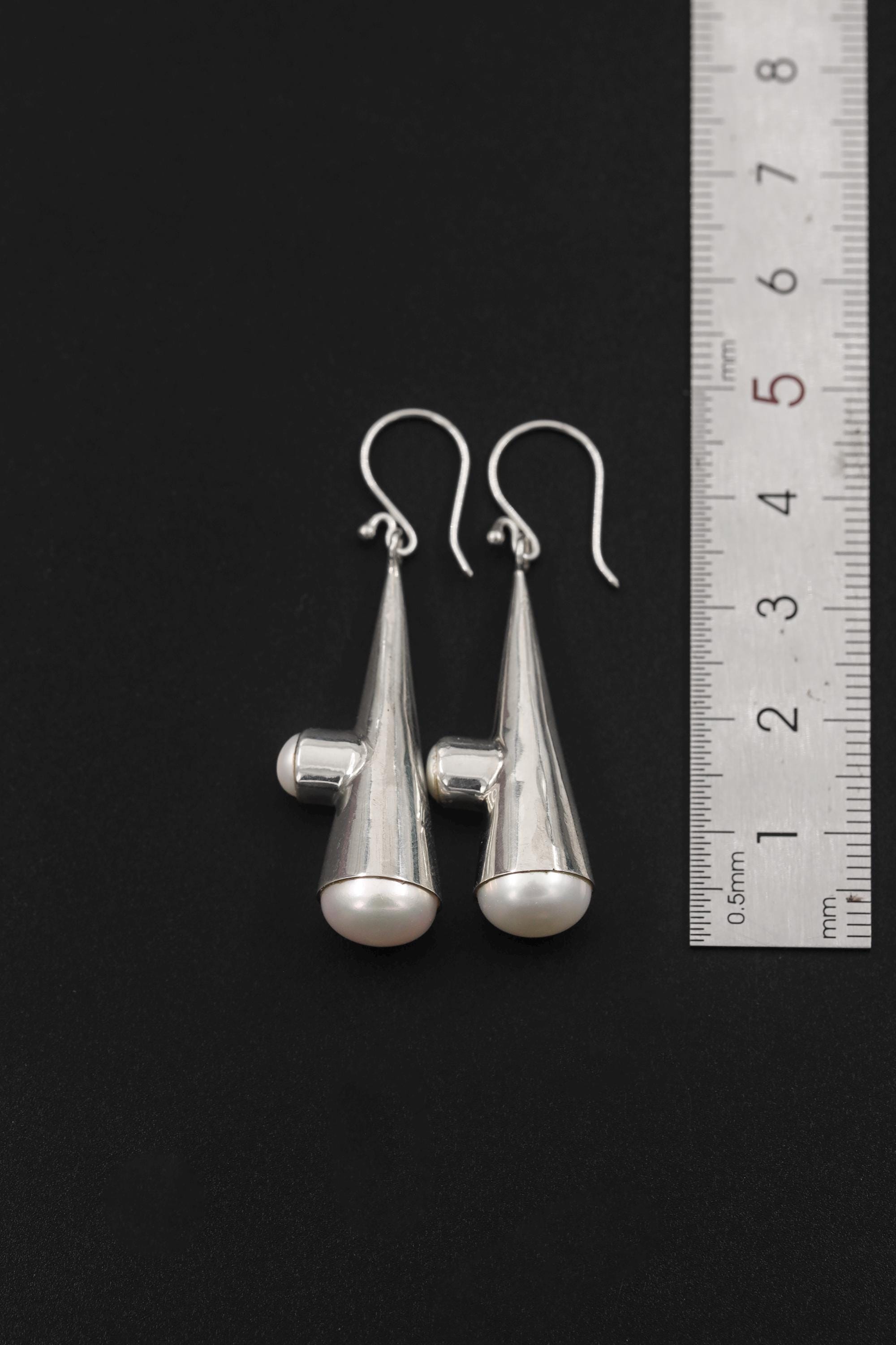 Pearl Cone Drop Earrings shown beside ruler for approximately 4 cm total drop length reference.