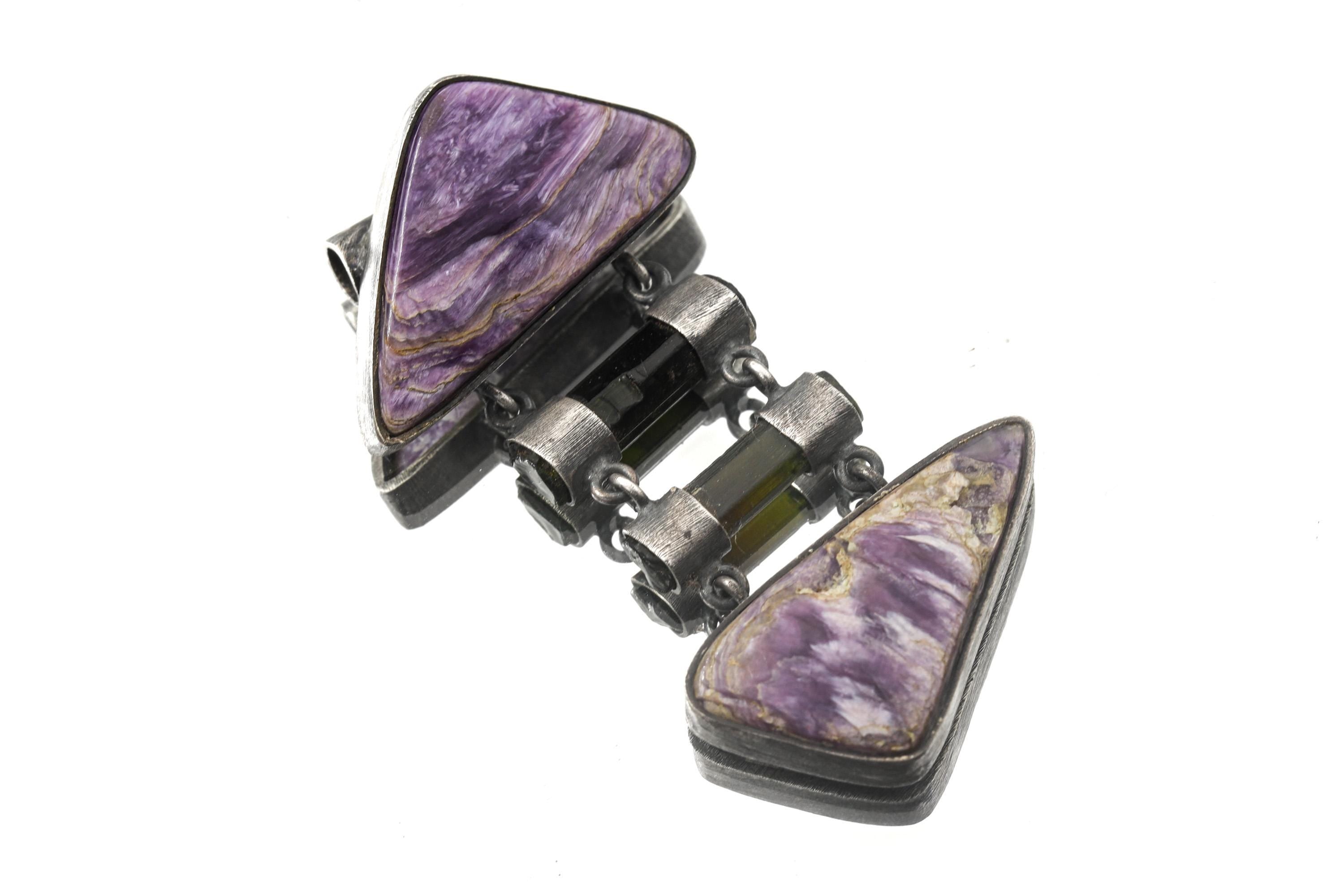 Charoite and Black Tourmaline heirloom pendant shown on a white background with hinged sterling silver construction.