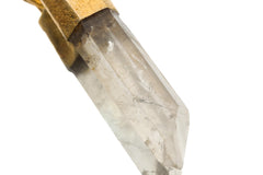 Close-up of Australian Lemurian Clear Quartz point in a gold-plated Monkey Tiger talisman pendant.