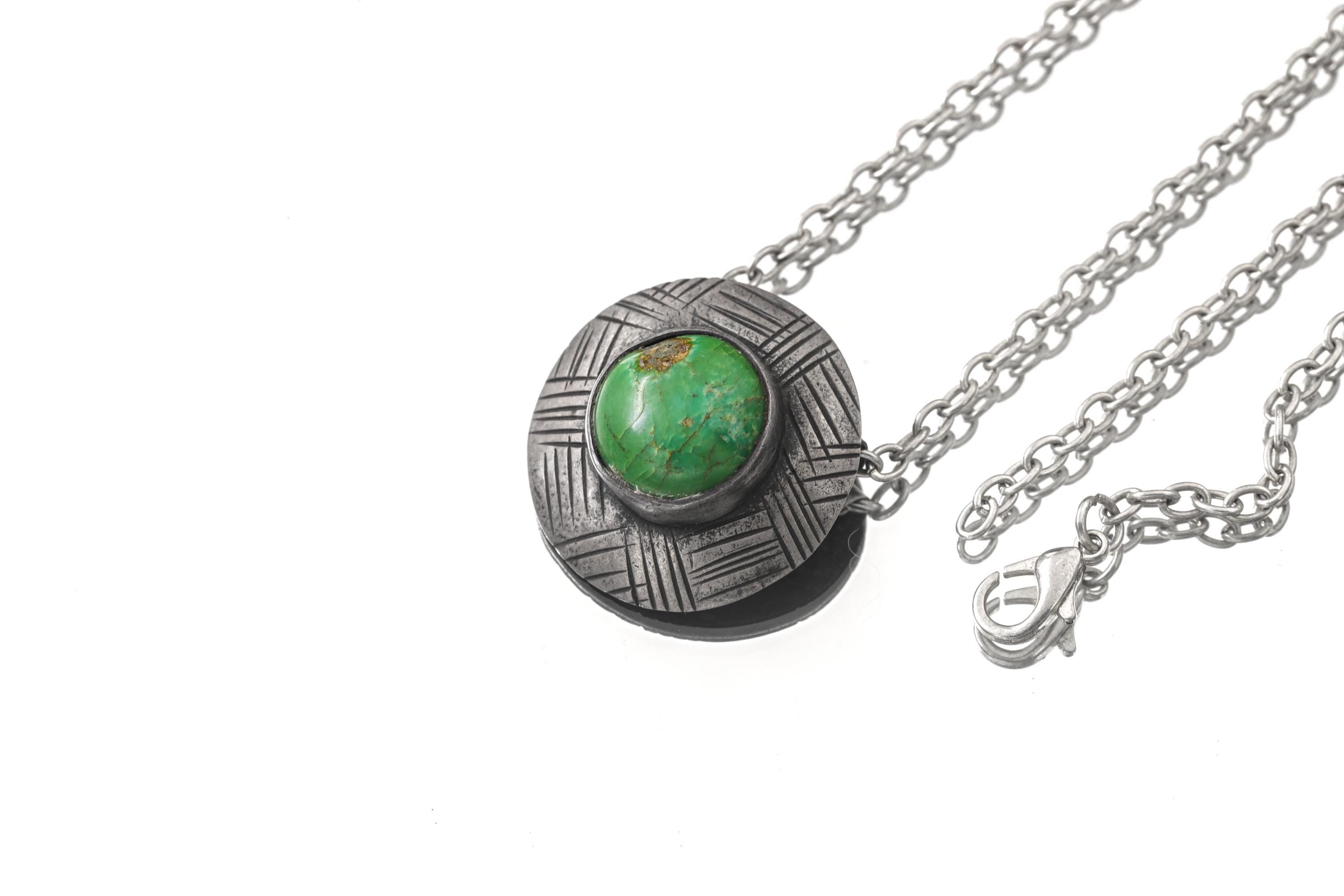 Green Turquoise stack pendant displayed with silver chain for necklace styling.
