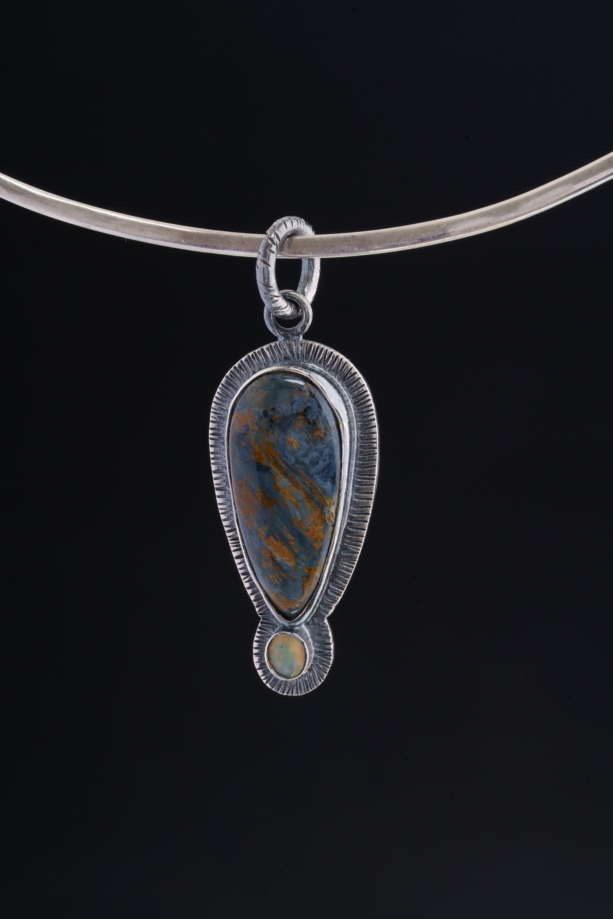Tempest Horizon - A Stunning Fusion of Pietersite's and Ethiopian Opal Pendant - Oxidised Sterling Silver with Sun Ray Details